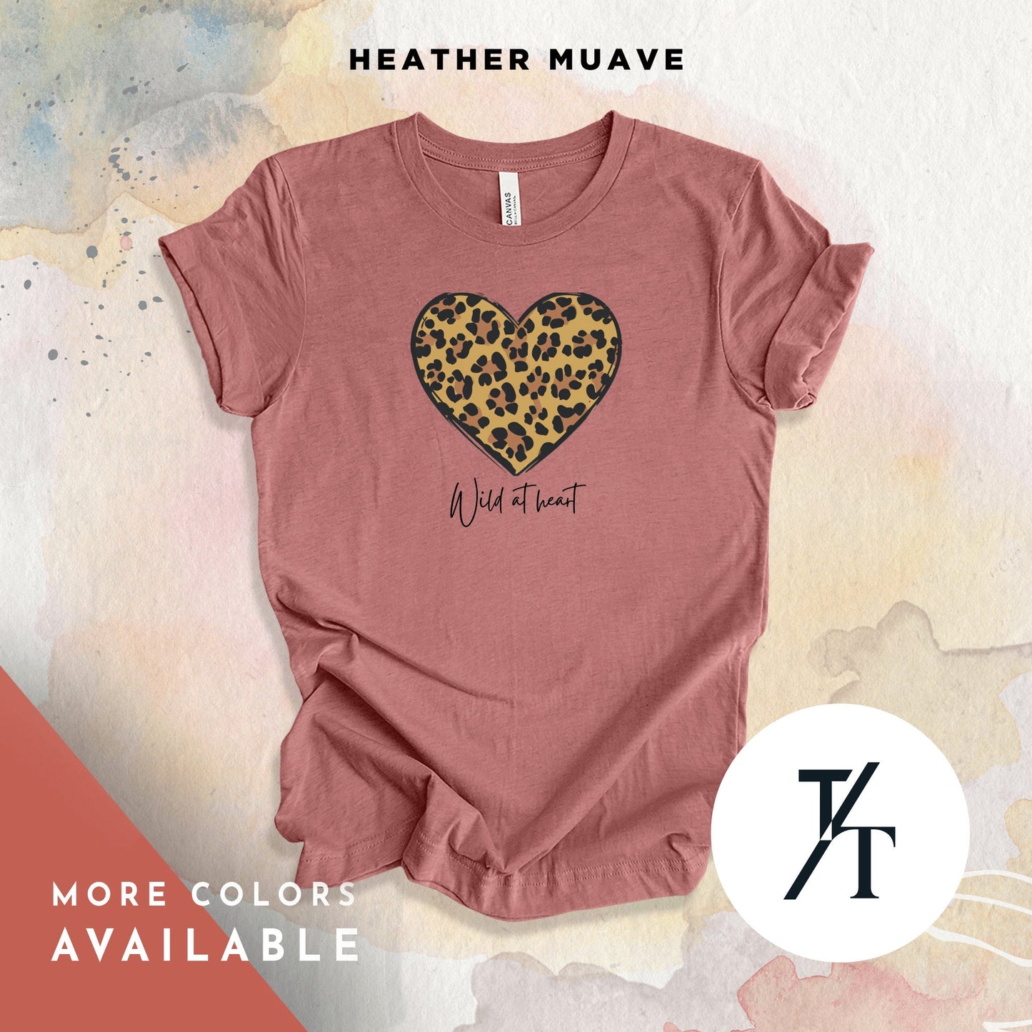 a pink shirt with a leopard print heart on it