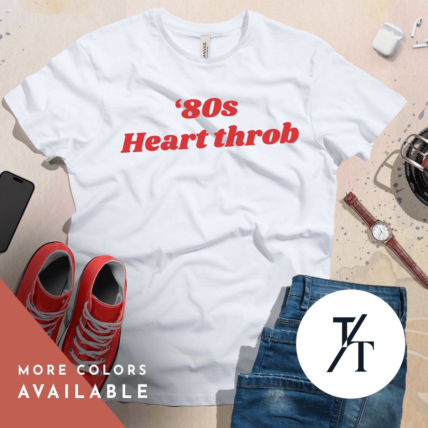 a man wearing a white t - shirt with the words 80's heart throb