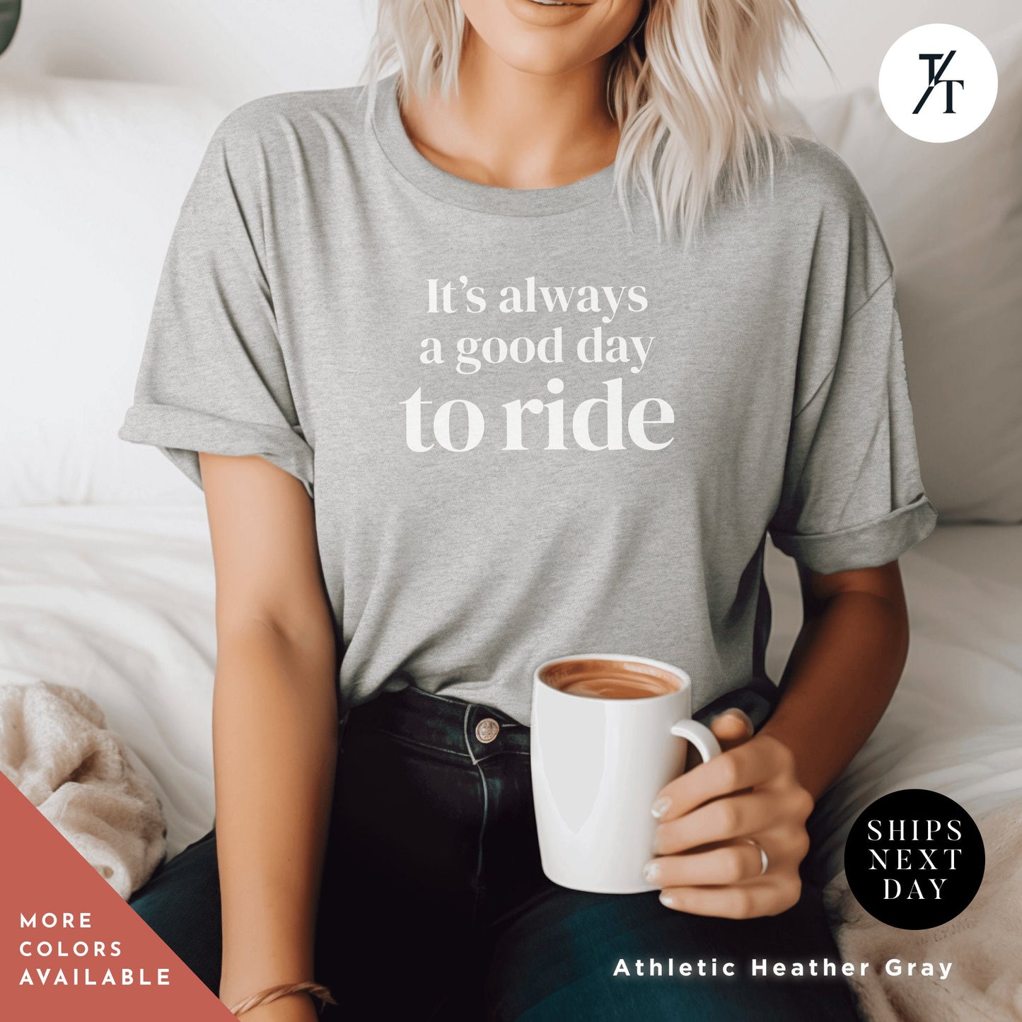 a woman sitting on a bed holding a cup of coffee