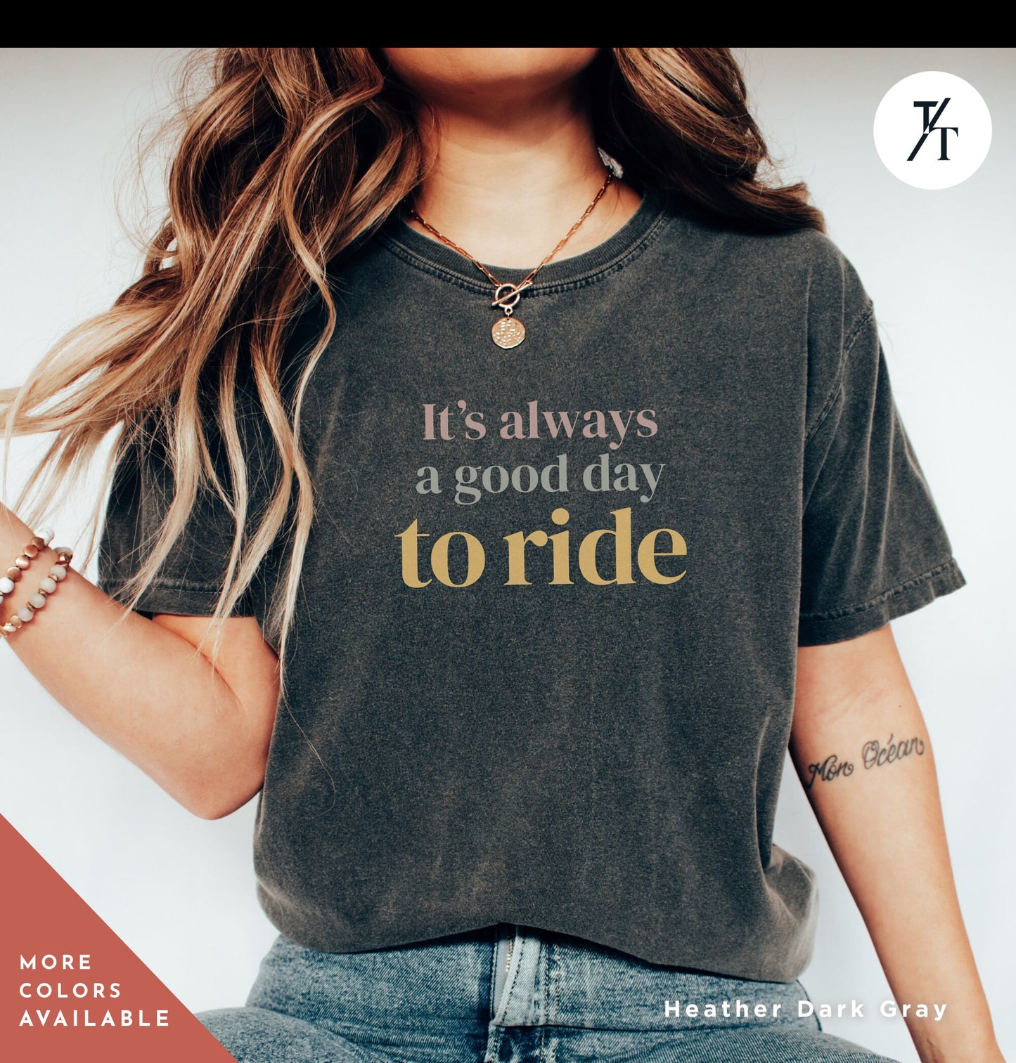 a woman wearing a shirt that says it's always a good day to ride