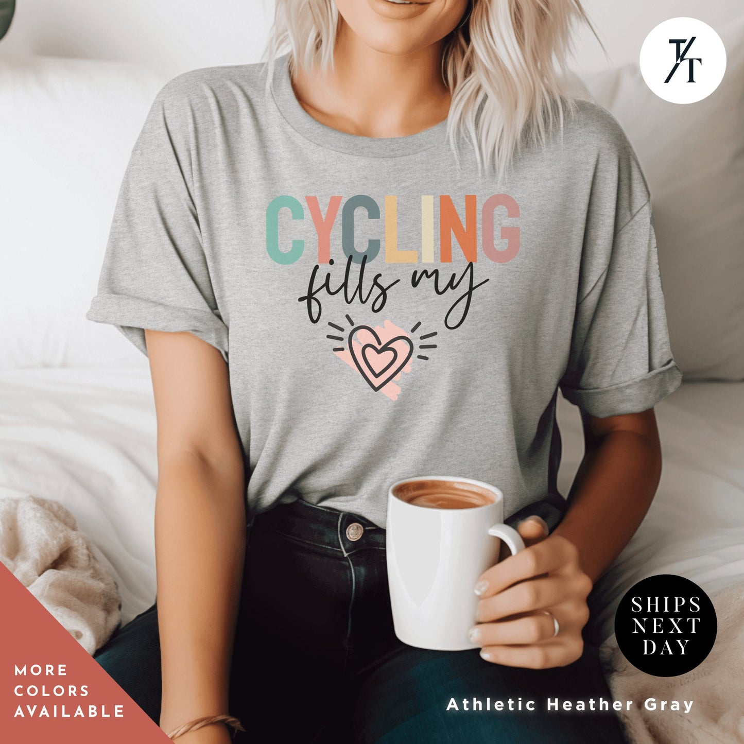 a woman sitting on a bed holding a cup of coffee