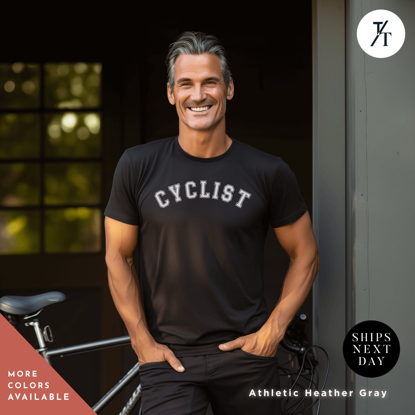a man standing next to a bike with his hands on his hips