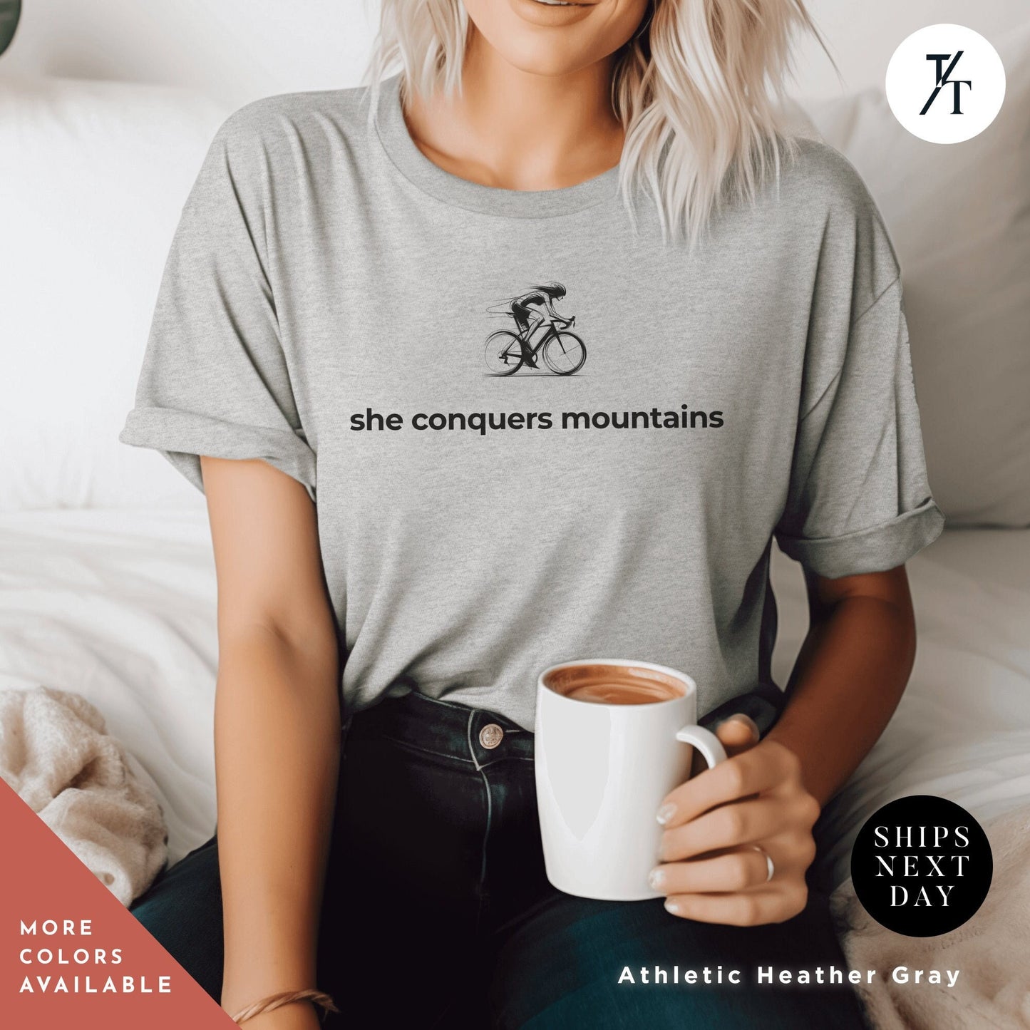 a woman sitting on a bed holding a cup of coffee