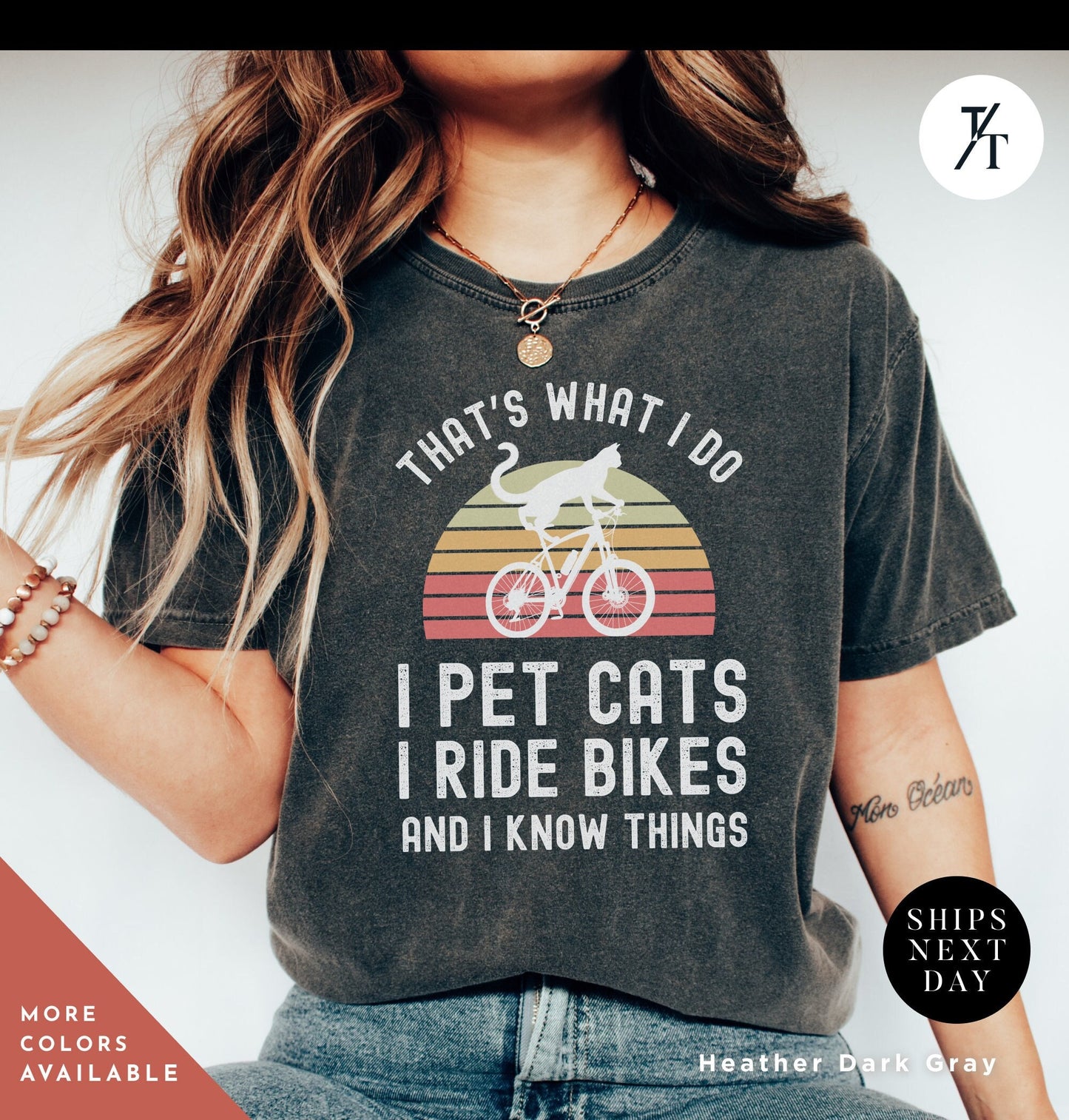 a woman wearing a shirt that says that's what i do i pet cats