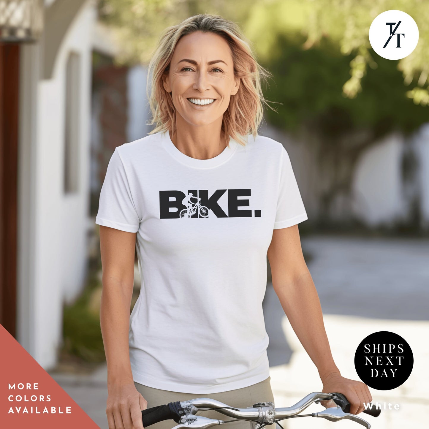 a woman riding a bike with a smile on her face