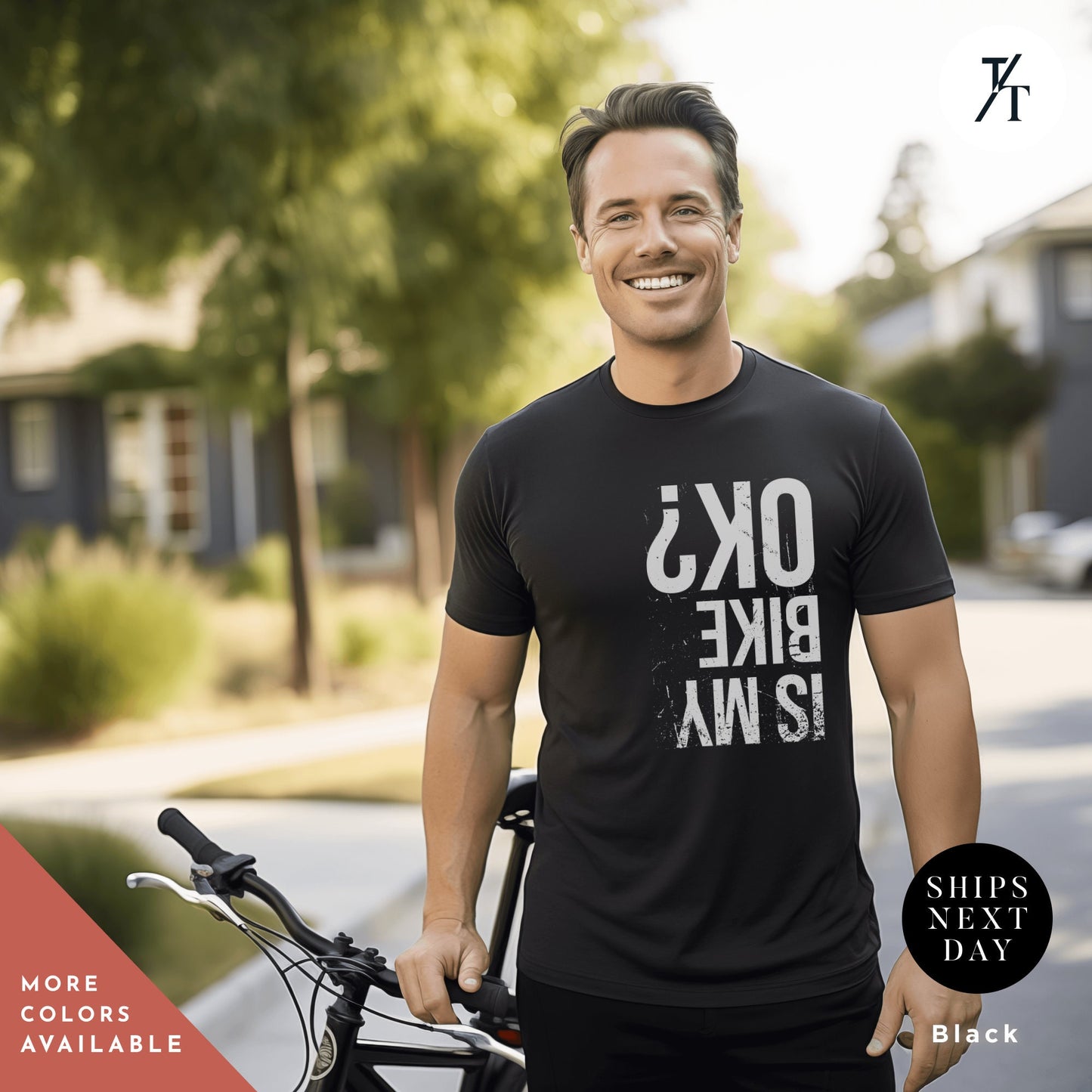 a man standing next to a bike in front of a house