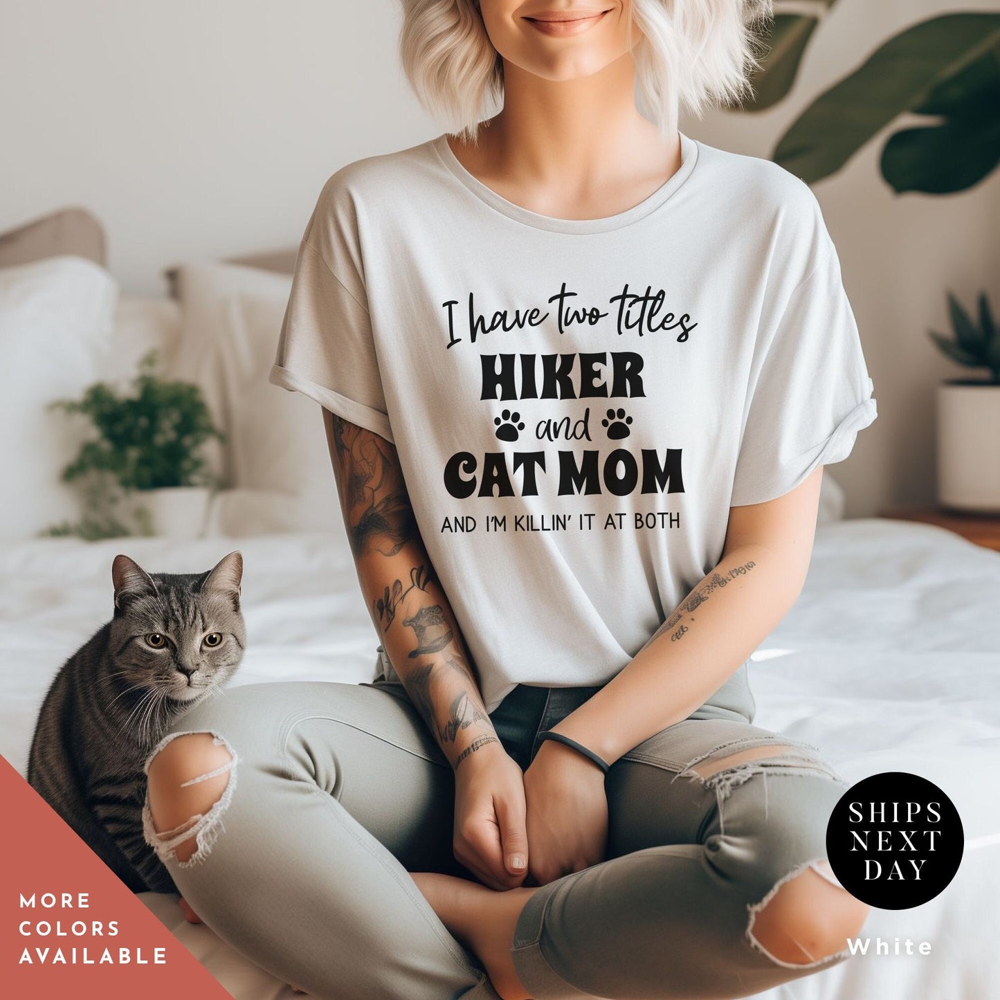 a woman sitting on top of a bed next to a cat Always Hiking Shirt, Hiking Gift, Nature Shirt, Travel tee, Mountain tShirt, Gift For Hiker, Wanderlust t-Shirt, Camping tshirt, hiking tee