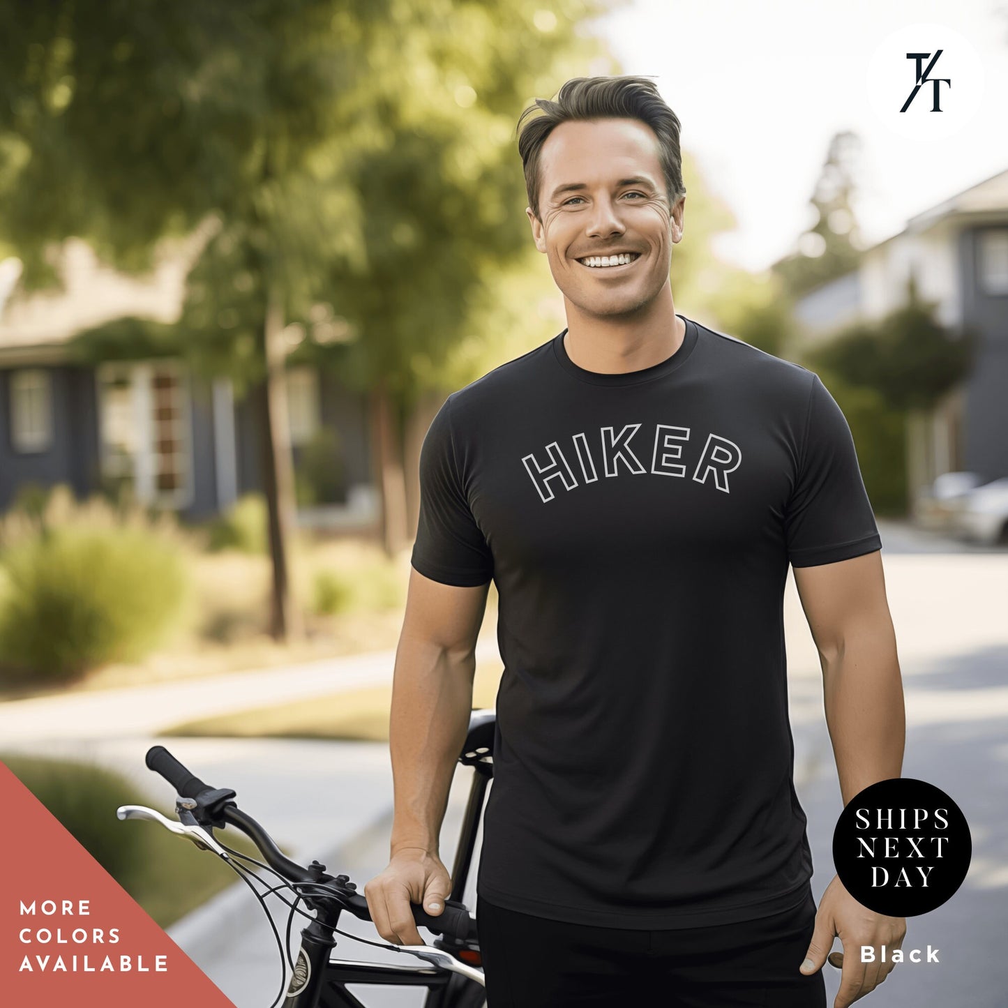 a man standing next to a bike in front of a house
