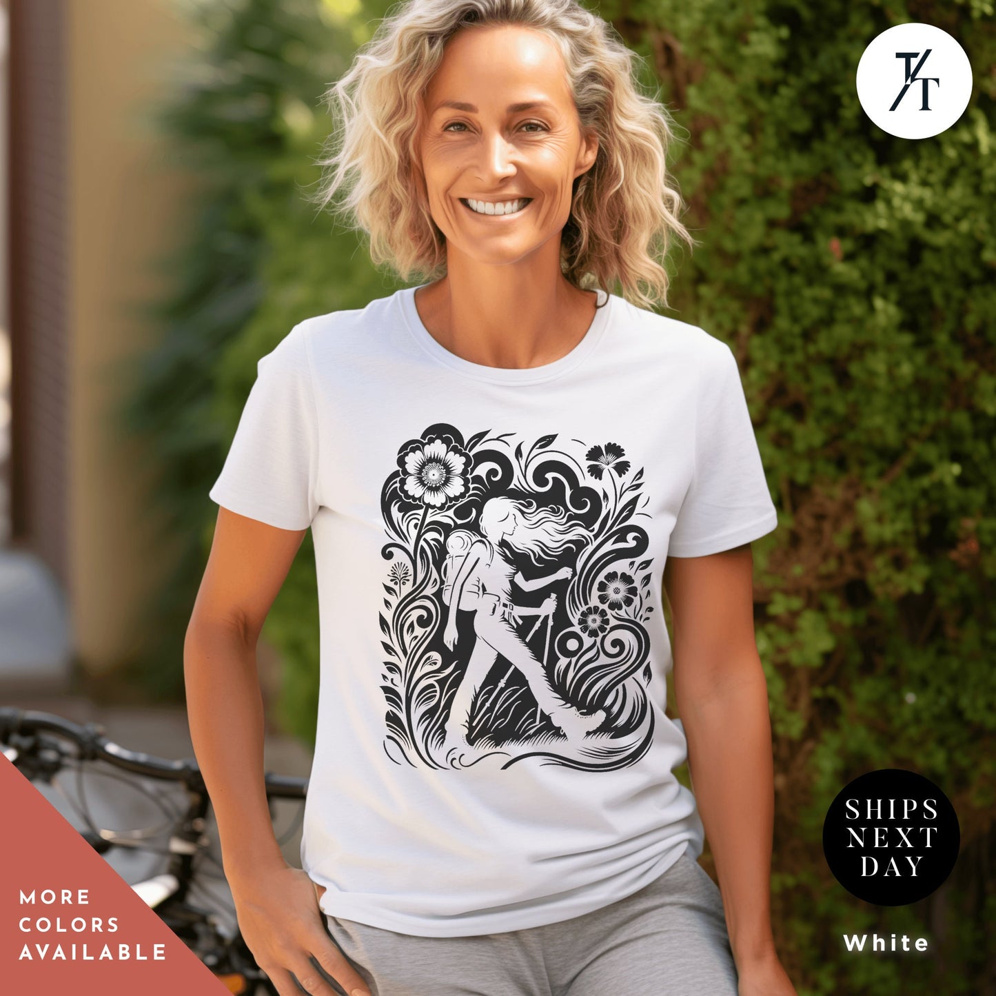 a woman wearing a t - shirt with a picture of a woman on it