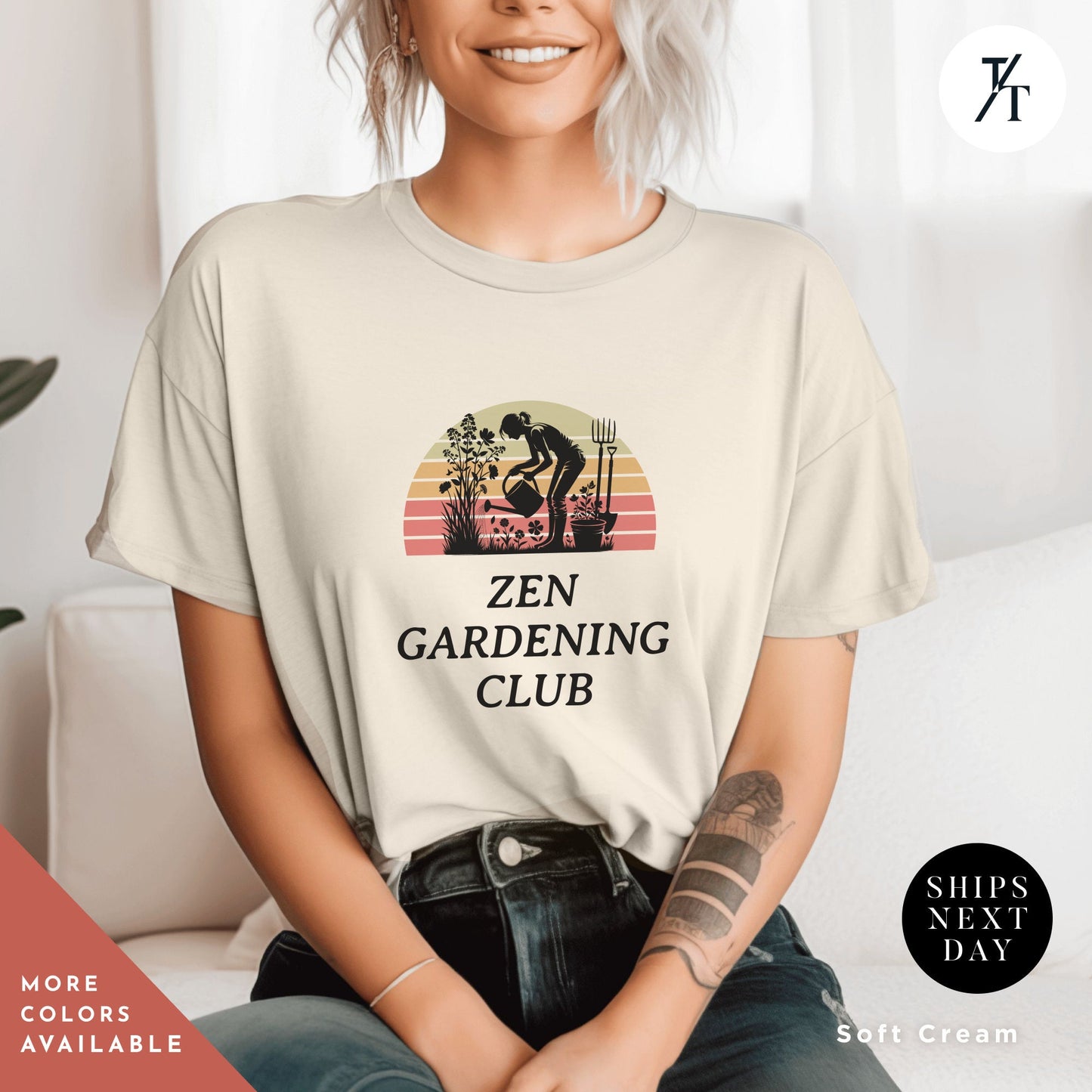 a woman sitting on a couch wearing a t - shirt