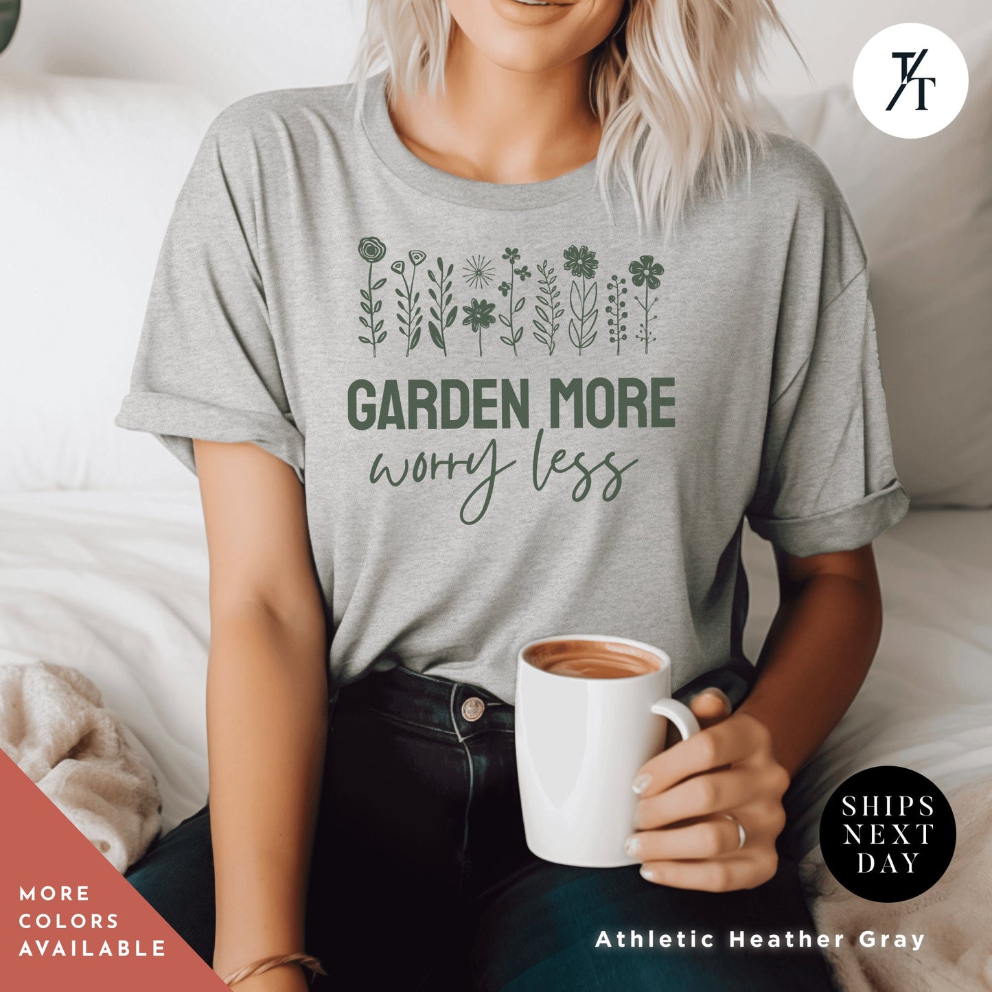 a woman sitting on a bed holding a cup of coffee