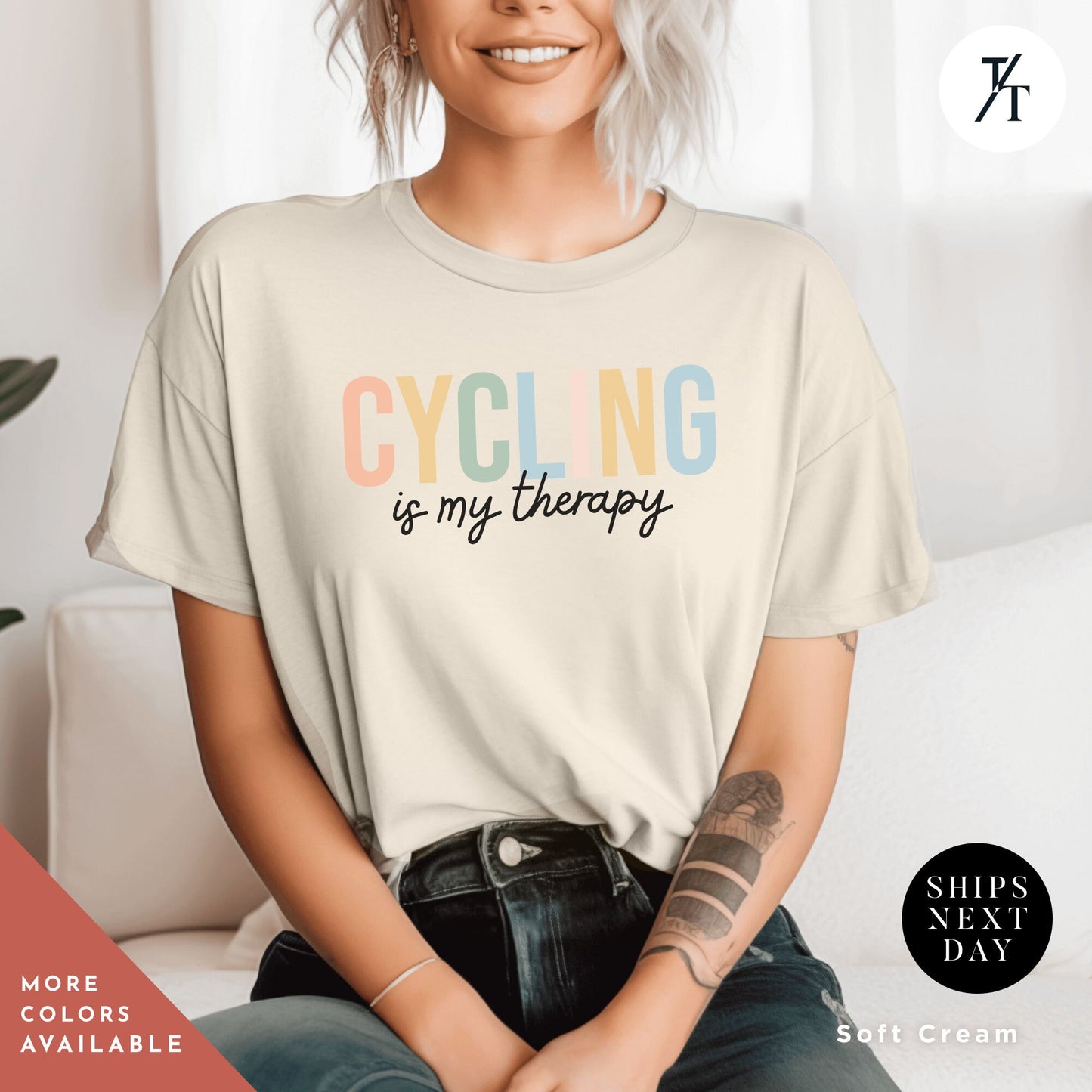 a woman wearing a t - shirt that says cycling is my therapy