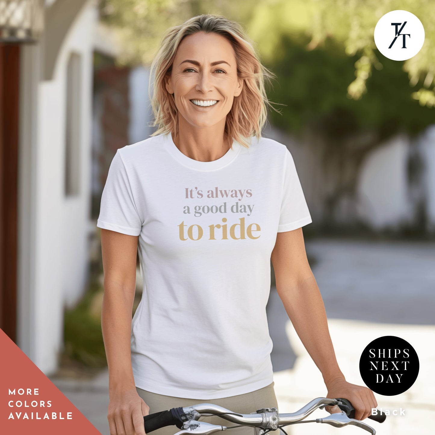 a woman riding a bike wearing a t - shirt that says it's always