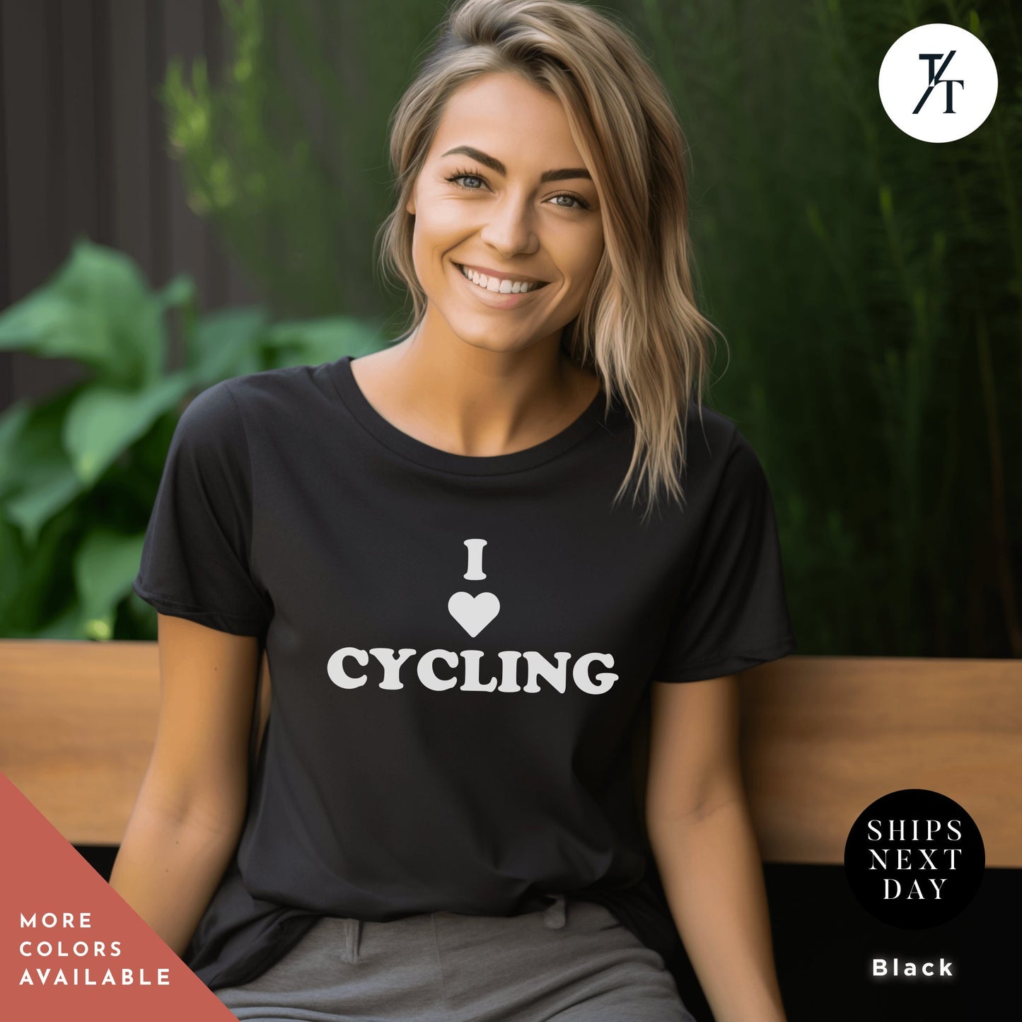 a woman sitting on a bench wearing a t - shirt that says i love cycling