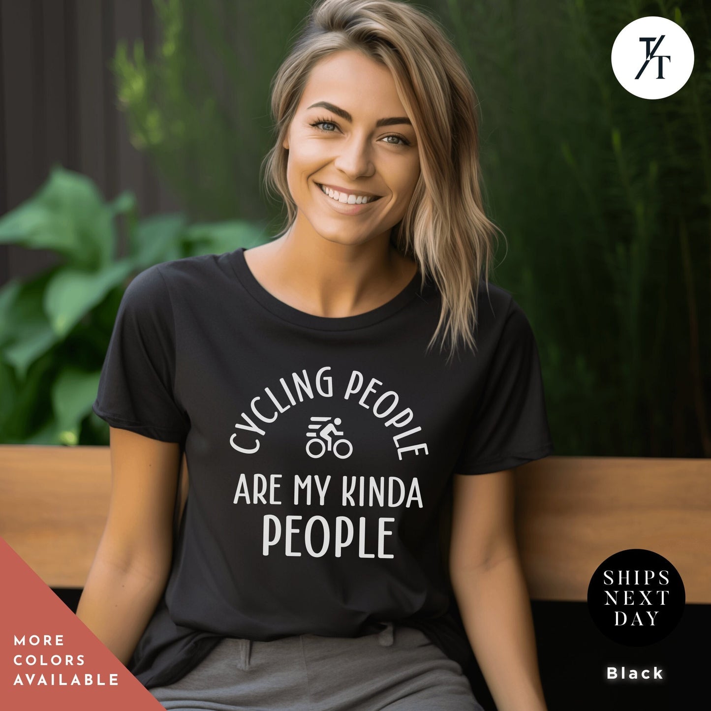 a woman sitting on a bench wearing a t - shirt that says cycling people are