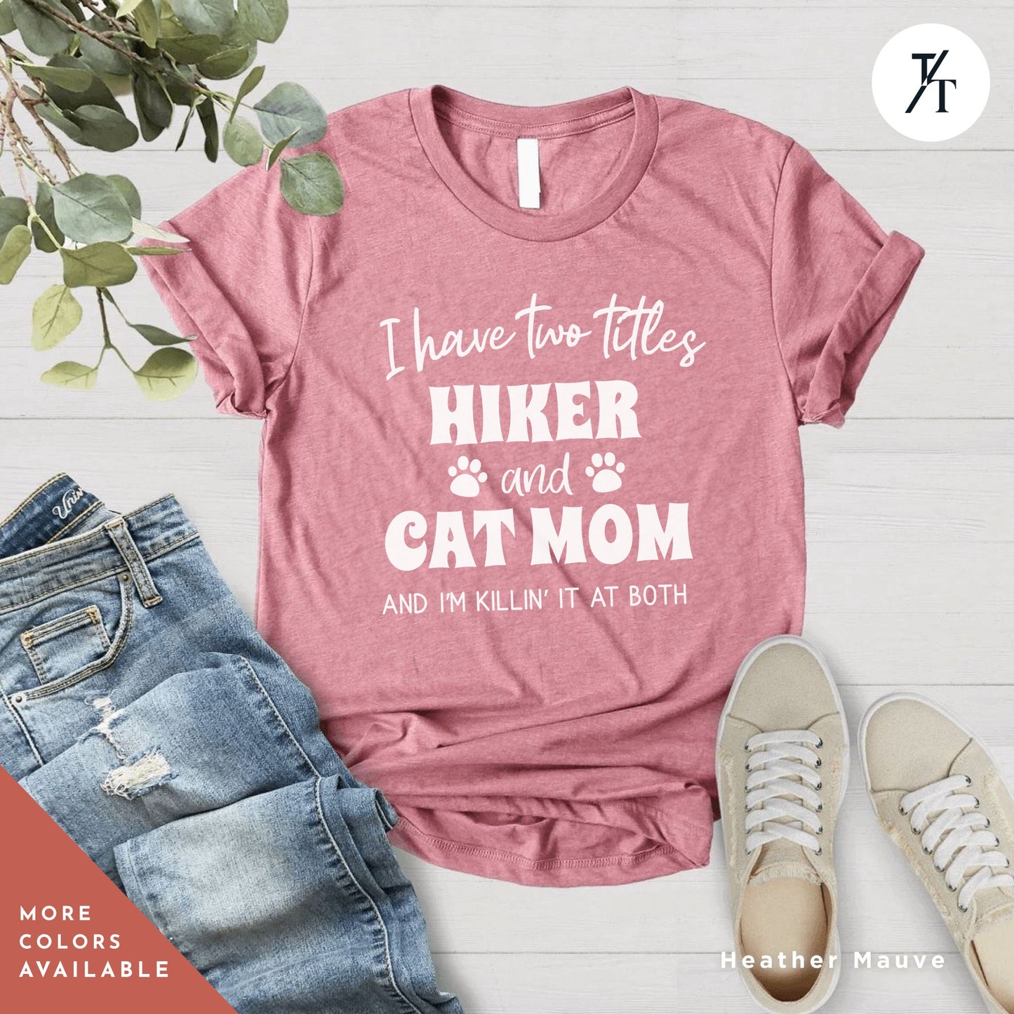 a pink shirt that says i have two titles, hike and cat mom and i