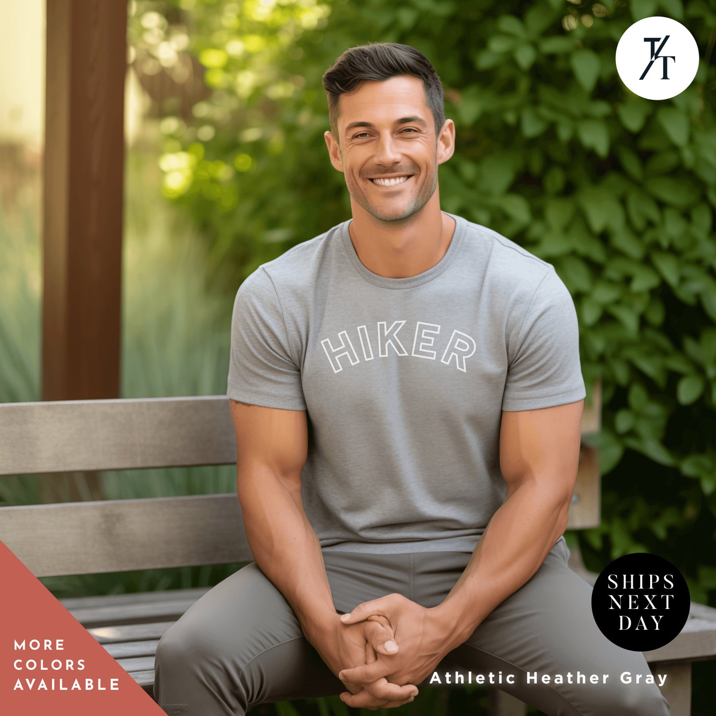 a man sitting on a bench smiling for the camera