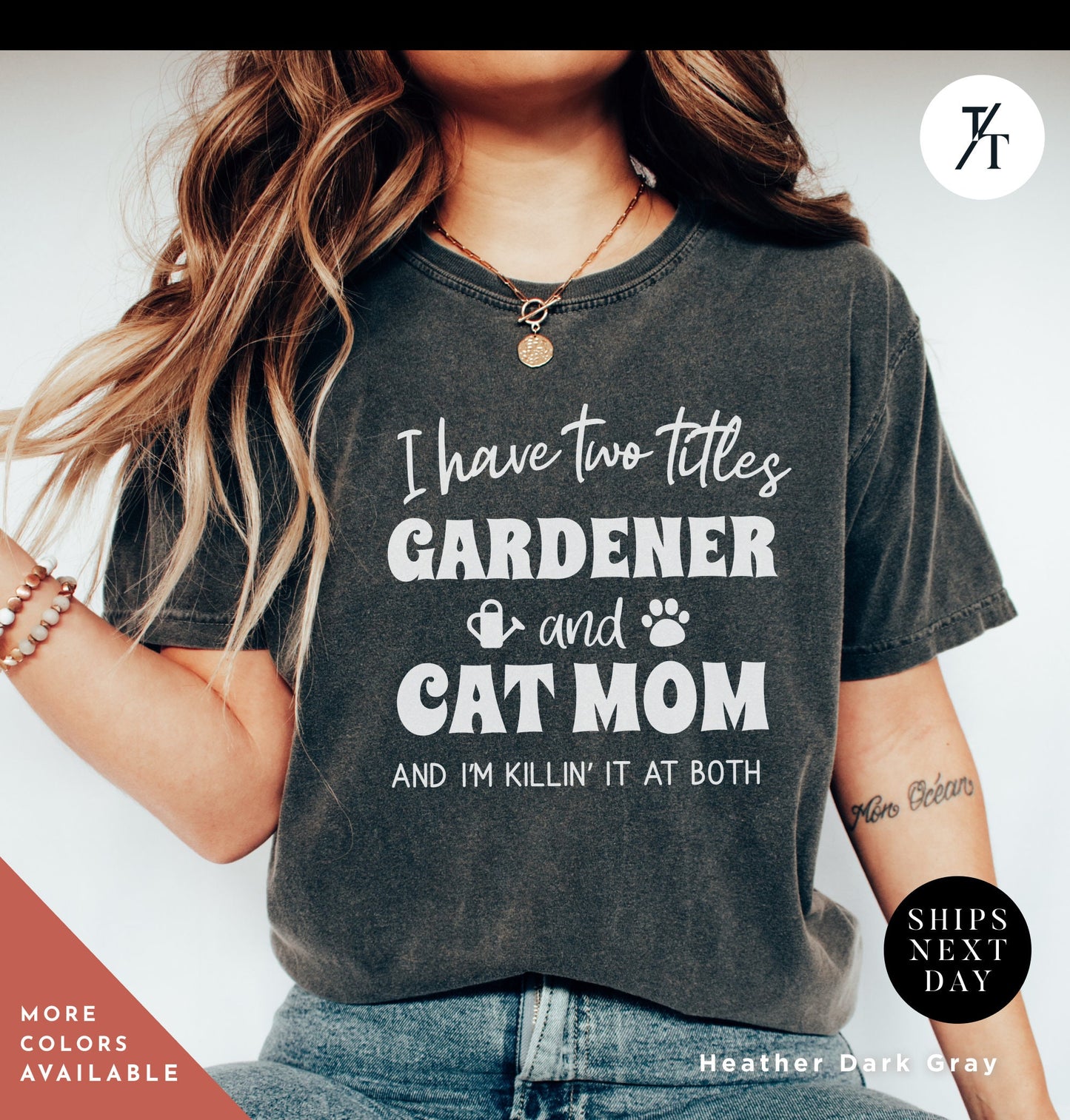 a woman wearing a t - shirt that says i have two titles gardener and cat