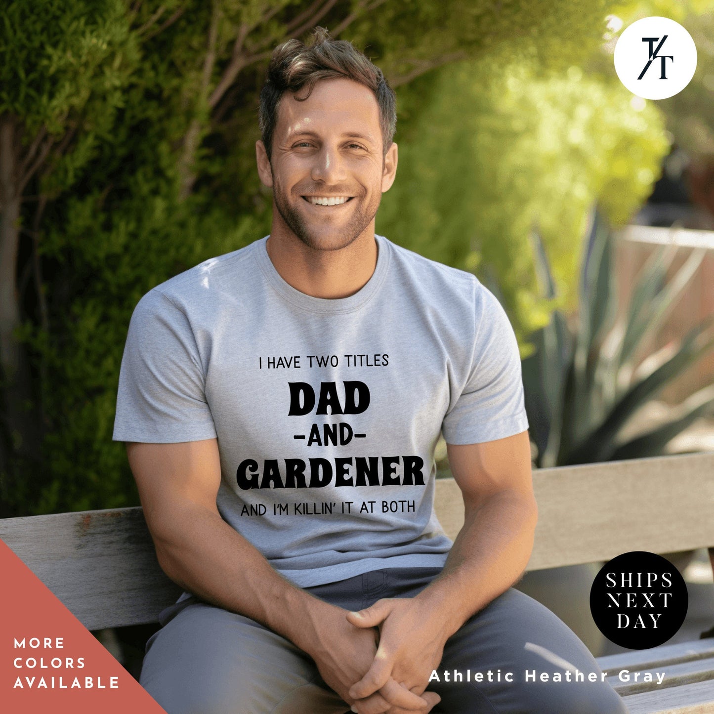 a man sitting on a bench wearing a t - shirt that says i have two