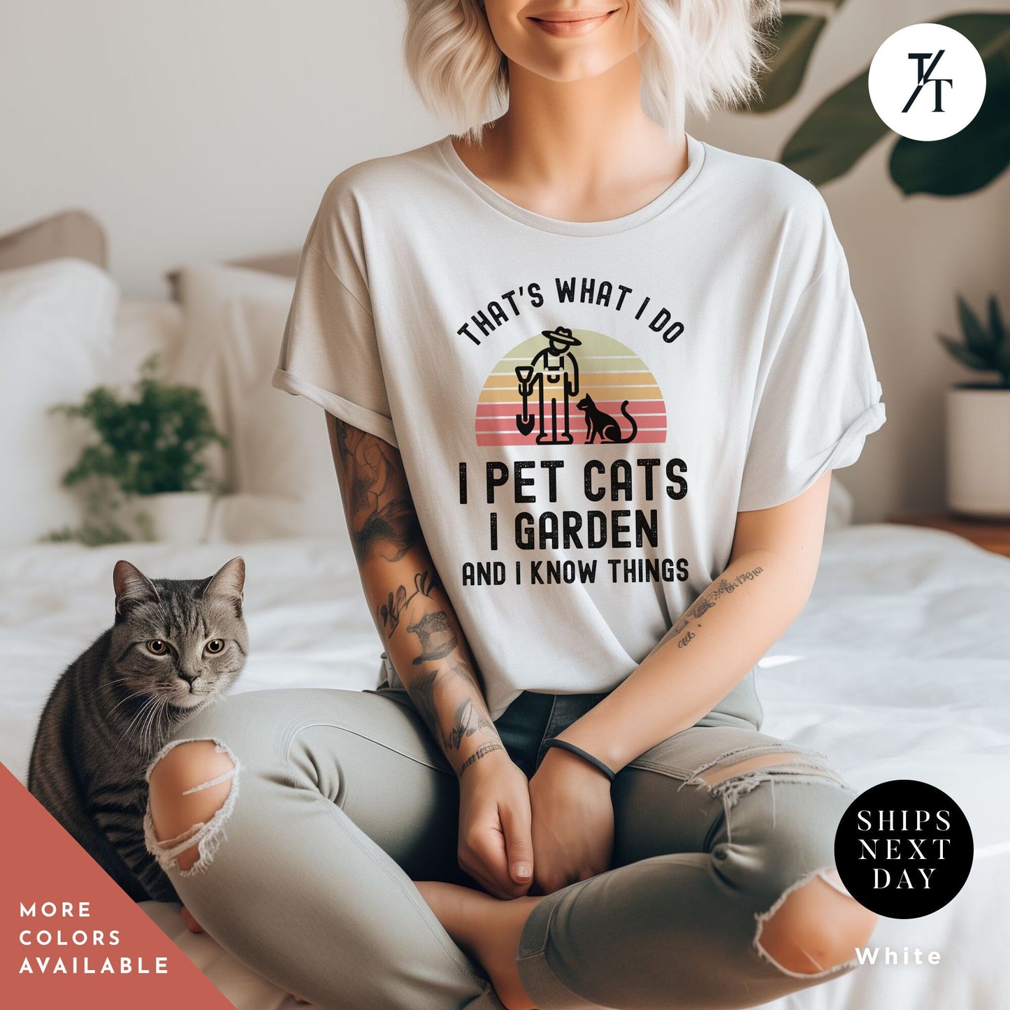 a woman sitting on a bed with a cat