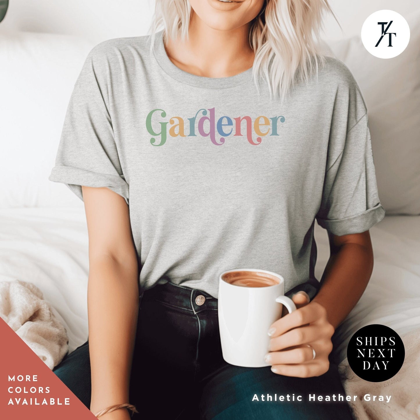 a woman sitting on a bed holding a cup of coffee