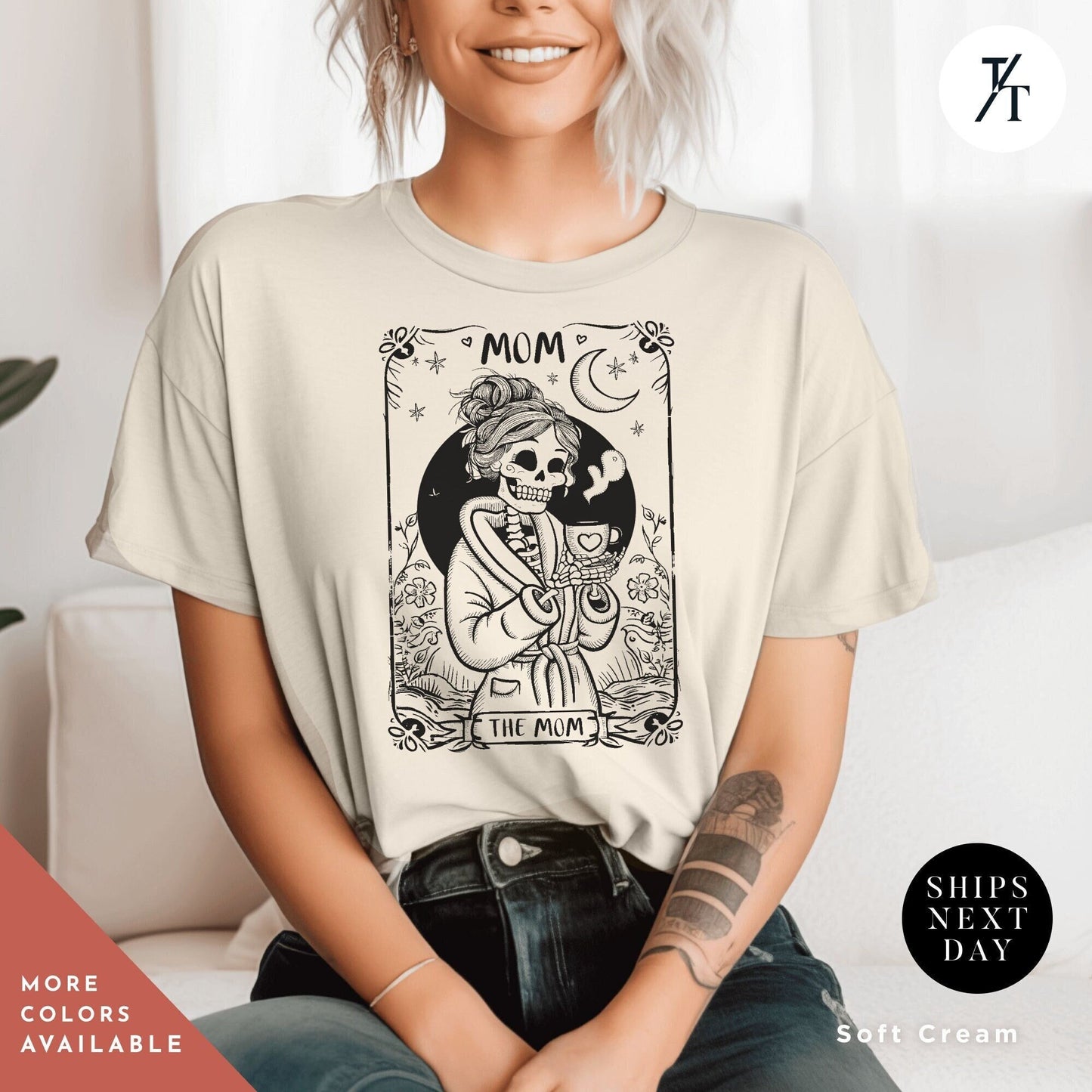 a woman sitting on a couch wearing a t - shirt, Mothers Day Shirt, New Mom Gift, The Mom Tarot Card, Witch Mama Shirt, Celestial Mom Tee, Skeleton Tarot Mom, Mothers Day Gift, Gift For Mom, Skeleton Sweatshirt, Momma Sweatshirt,