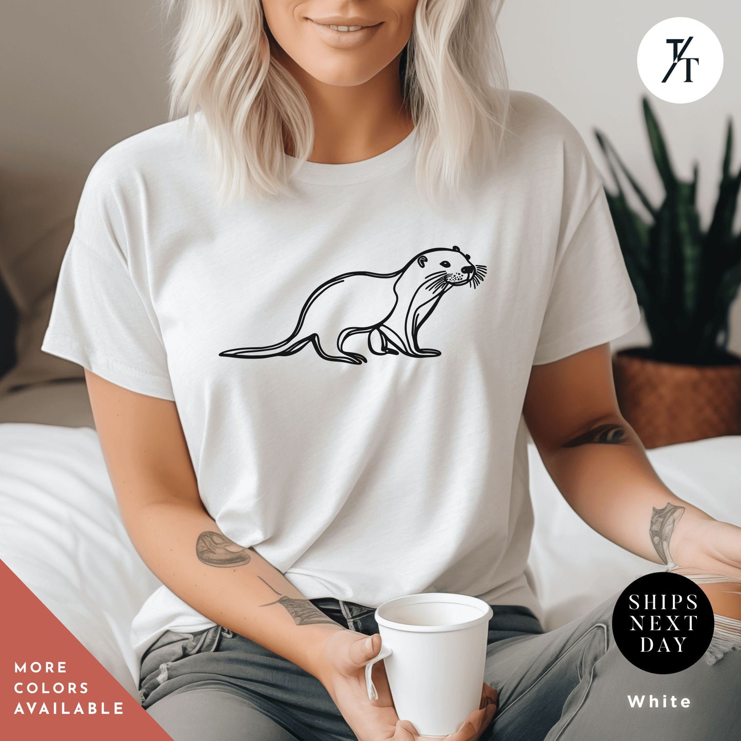a woman sitting on a bed holding a cup of coffee, Otter Lover Shirt, One Line Art Shirt, Sea Otter Gifts, Line Drawing Shirts, Otters TShirt, Gift For Her, Sea Otters Tshirt, Cute Animal tee