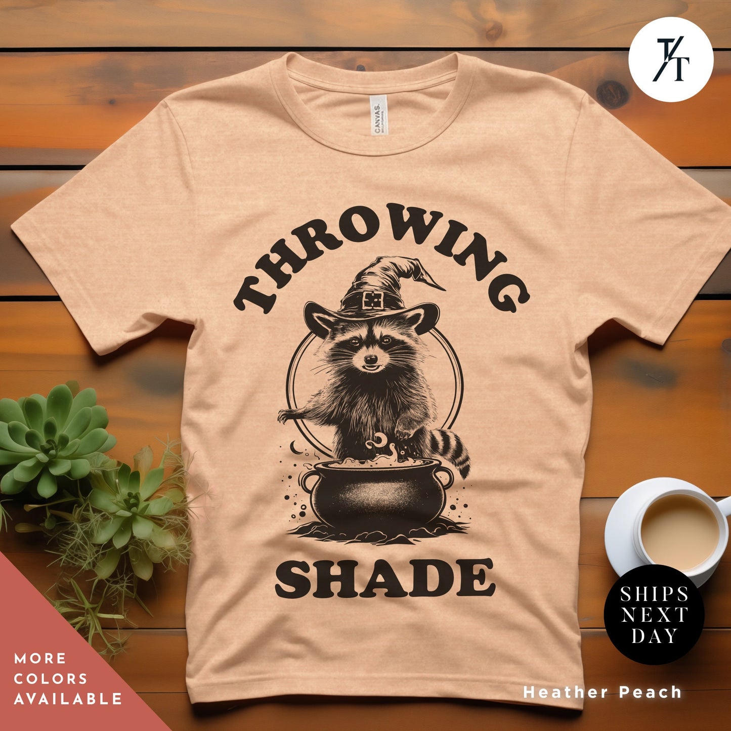 a t - shirt with a raccoon wearing a hat and holding a pot, , Funny halloween Raccoon shirt, Halloween Gifts, Cute Retro Raccoon Tee, Meme Lover, Throwing Shade Tee, Be A Witch tee, Groovy Graphic Tees