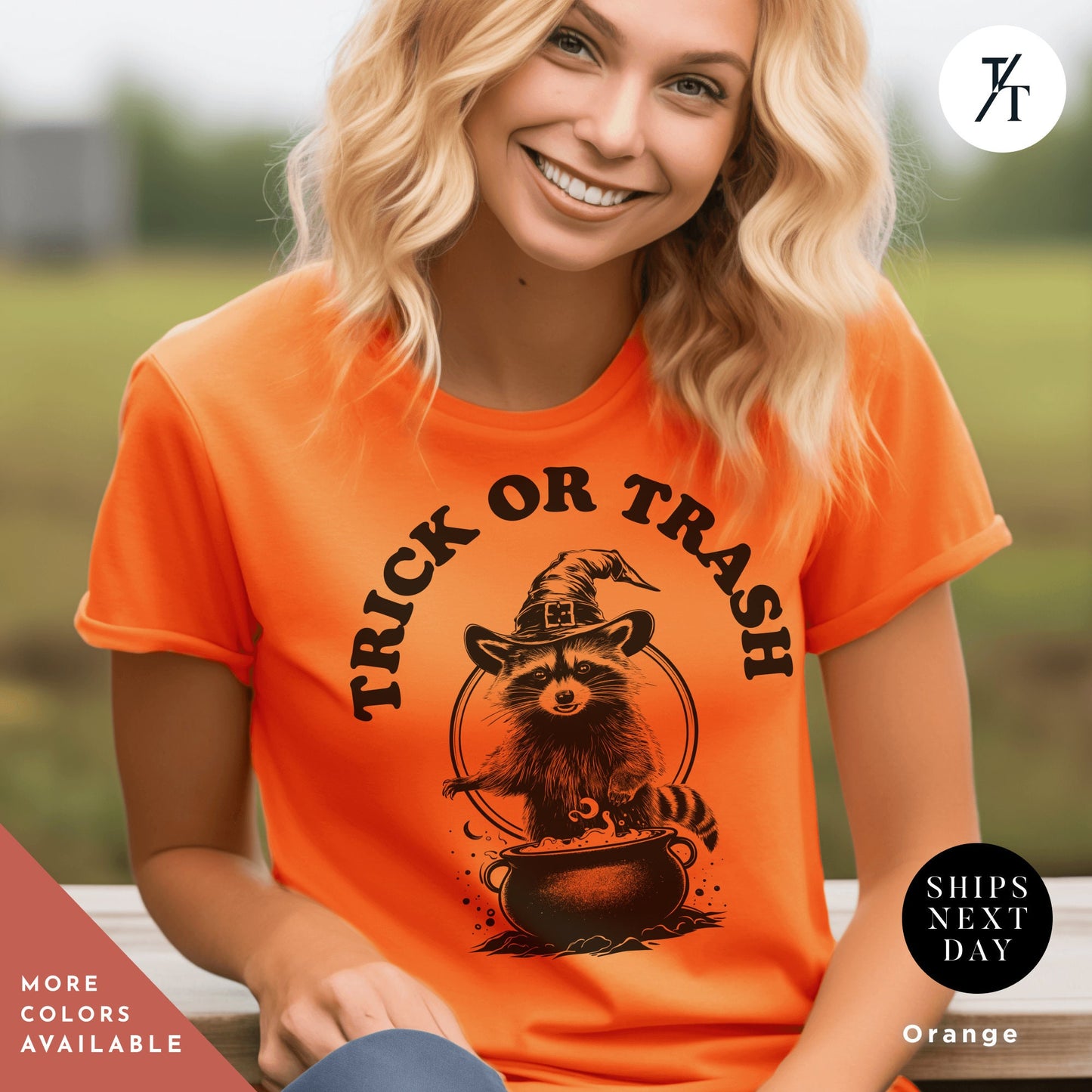 a woman sitting on a bench wearing an orange shirt, Trick or Trash Shirt, Raccoon Halloween, Funny Raccoon Shirt, Spooky Season, Funny Feral Girl Halloween Party, Trick Or Treat Trash Panda