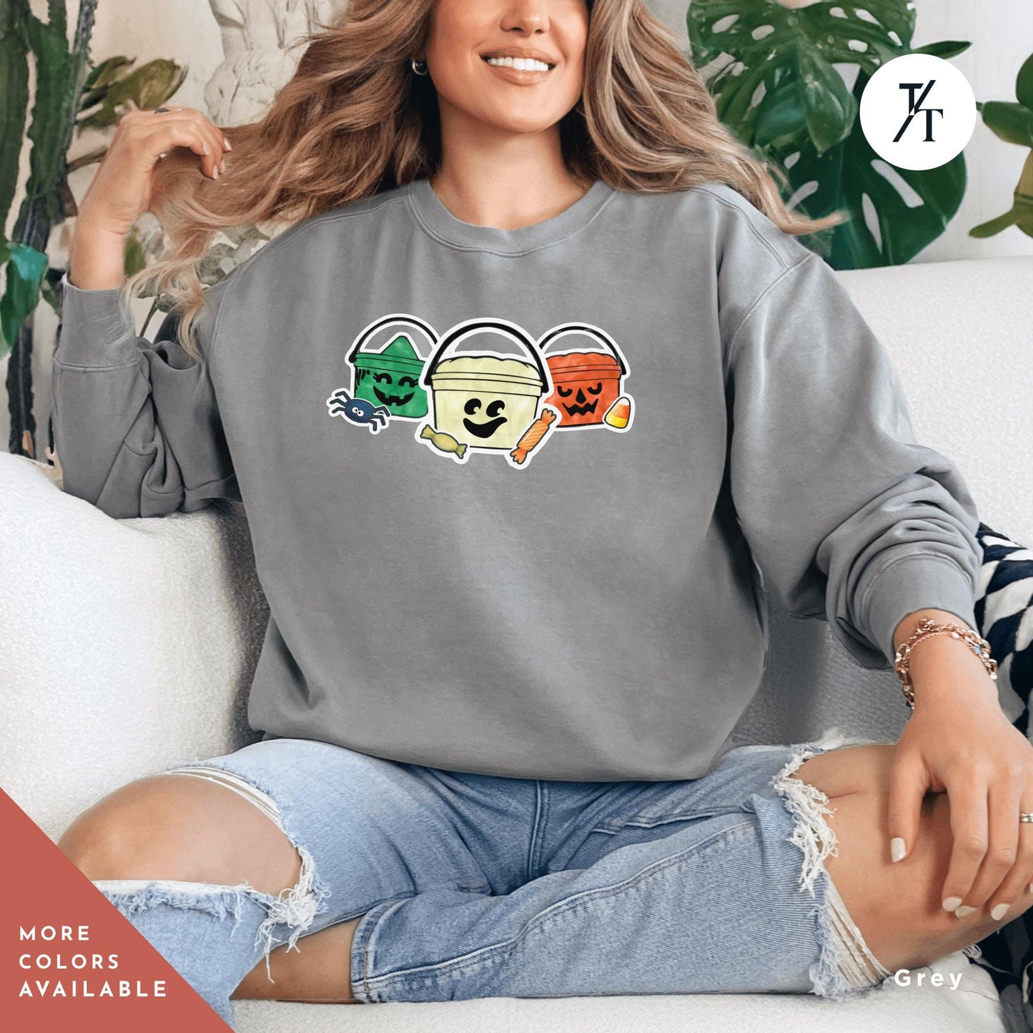 a woman sitting on a couch wearing a grey sweatshirt, Comfort colors halloween boo bucket sweatshirt, Boo Bucket Shirt, Mcdonalds Halloween Sweatshirt, Retro 90S Crewneck sweater 90S Ghoul