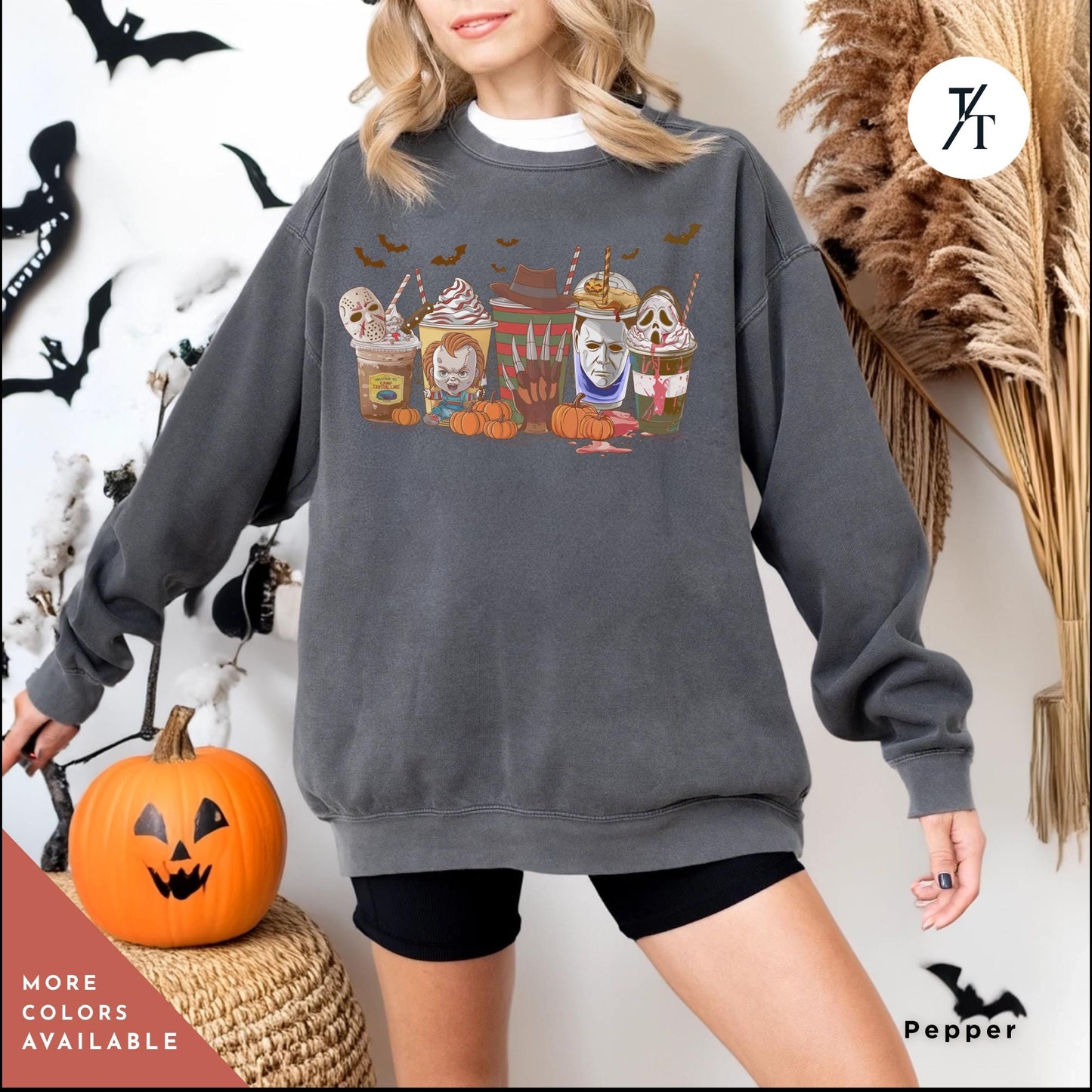 a woman wearing a dark grey sweatshirt with a picture of group of halloween horror characters on coffee drinks on it, Skeleton Coffee Cups Sweatshirt, Coffee Cups Sweatshirt, Skull Coffee Cup Sweatshirt, Skeleton Halloween Sweatshirt,