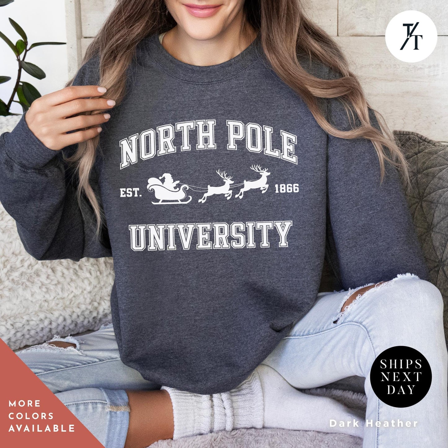 a woman sitting on a couch wearing a north pole university sweatshirt, North Pole university sweatshirt, Christmas Sweatshirt, Christmas Gift, North Pole Sweater, Xmas Shirt, Winter University, College Sweater