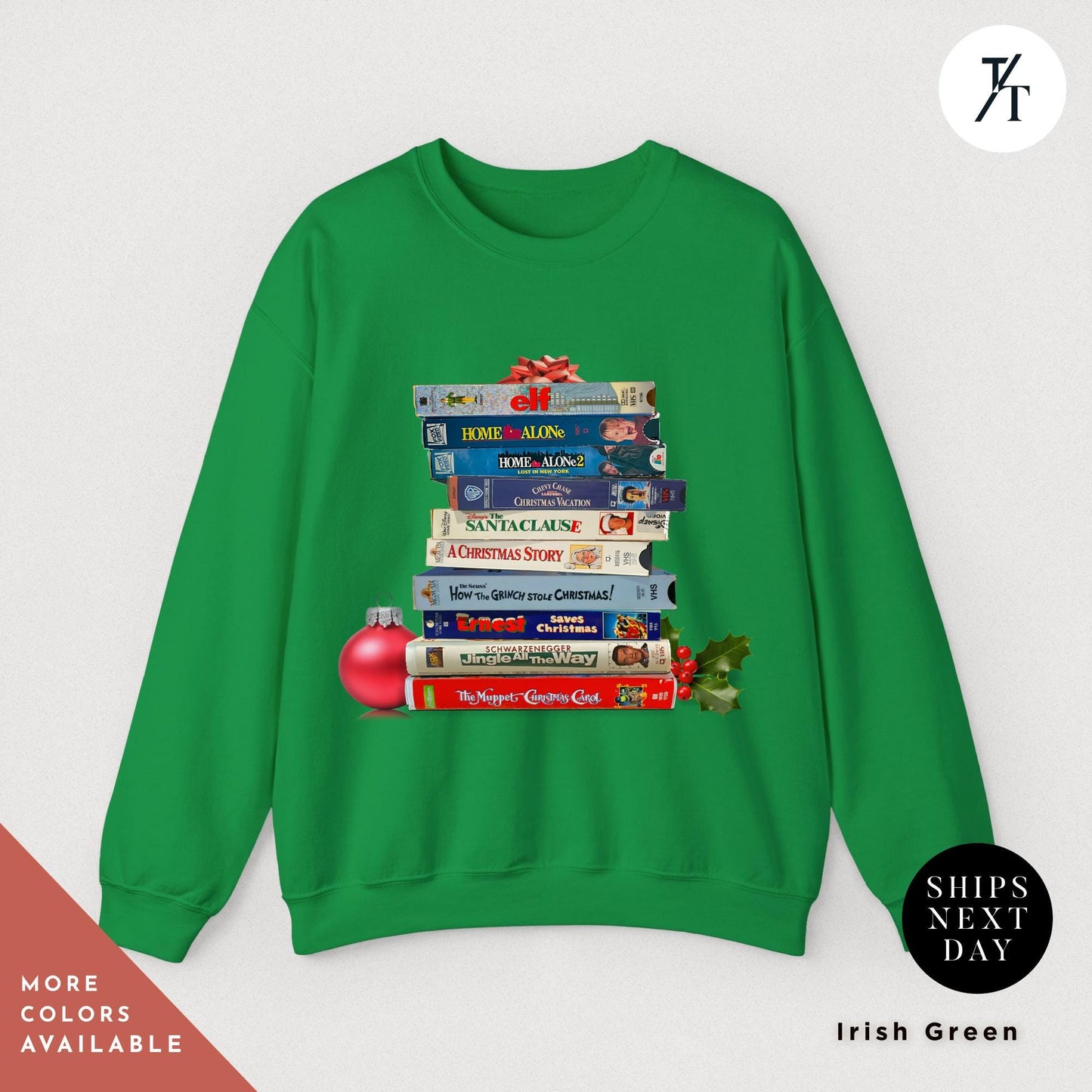 a green sweatshirt with a stack of VHS tapes on it, Vintage christmas vhs sweatshirt, Christmas Sweatshirt, Holiday Crewneck, Vhs Movies Sweater, Gift For Her, Retro Xmas Video Cassette Tapes