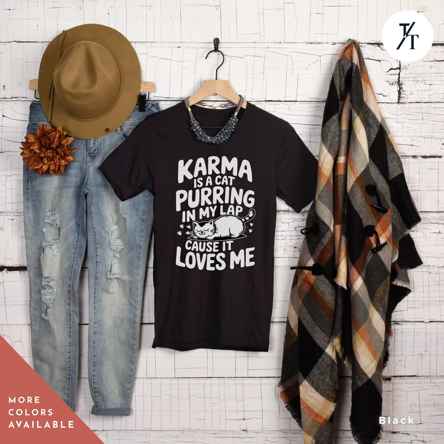 a pair of jeans and a t - shirt hanging on a wall, Karma is a Cat Purring in my Lap Cause it Loves Me Shirt, Karma Is A Cat Shirt, Cats Lover Shirt, Taylor Swiftie Merch, Eras Concert Shirts