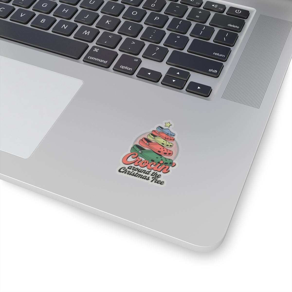 a laptop computer with a sticker on the keyboard, crocin around the christmas tree sticker Stocking Stuffer Crocin Around Tree, Water Bottle Decal, Funny Quote Stickers, Laptop Decals Gift