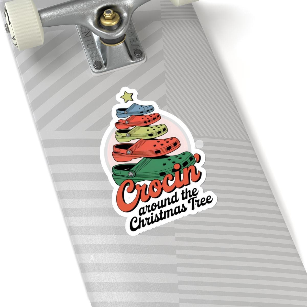 a close up of a skateboard with a sticker on it, crocin around the christmas tree sticker Stocking Stuffer Crocin Around Tree, Water Bottle Decal, Funny Quote Stickers, Laptop Decals Gift