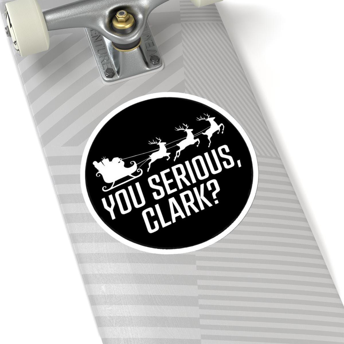 a skateboard with a sticker that says you serious, clark?, National Lampoons Decal, Christmas Vacation stickers, Chevy Chase Stocking Stuffer, Funny You Serious Clark Christmas Vinyl Laptop Stickers