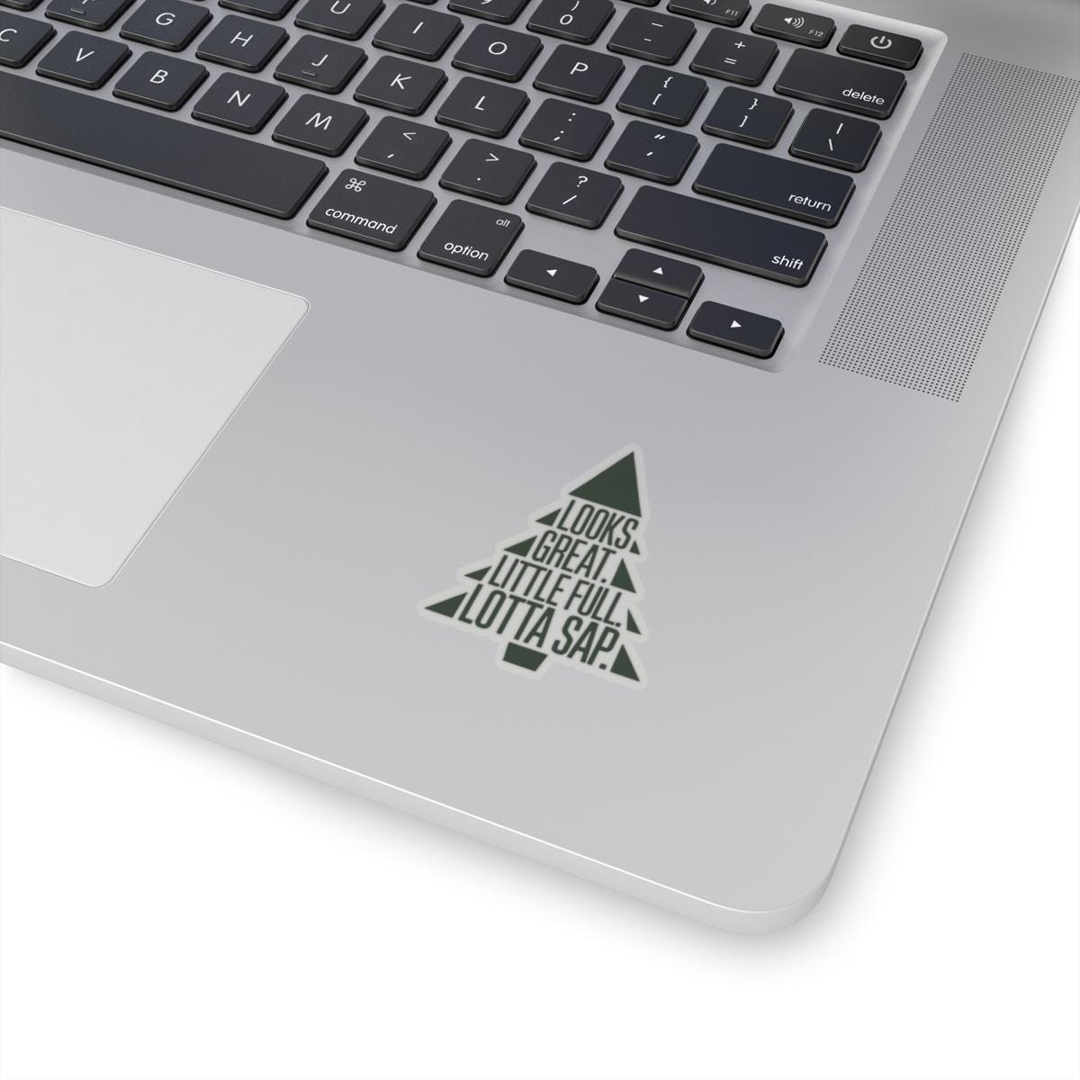 a laptop with a christmas tree sticker on it, National Lampoons Decal, Christmas Vacation stickers, Chevy Chase Stocking Stuffer, Funny You Serious Clark Christmas Vinyl Laptop Stickers