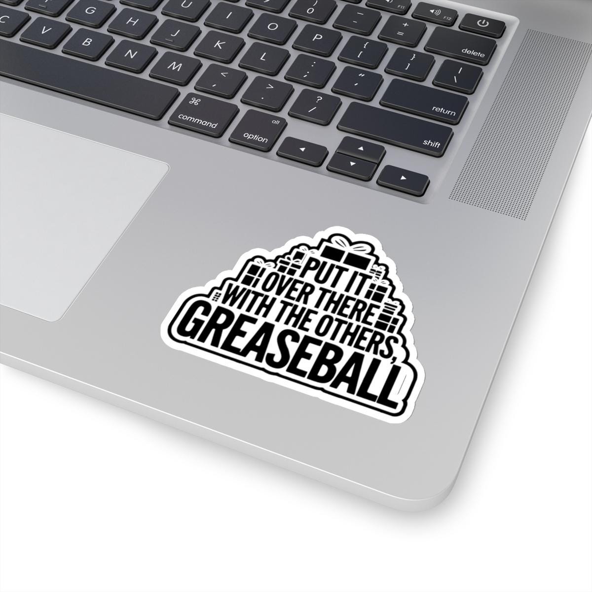 a laptop computer with a sticker on it, National Lampoons Decal, Christmas Vacation stickers, Chevy Chase Stocking Stuffer, Funny You Serious Clark Christmas Vinyl Laptop Stickers