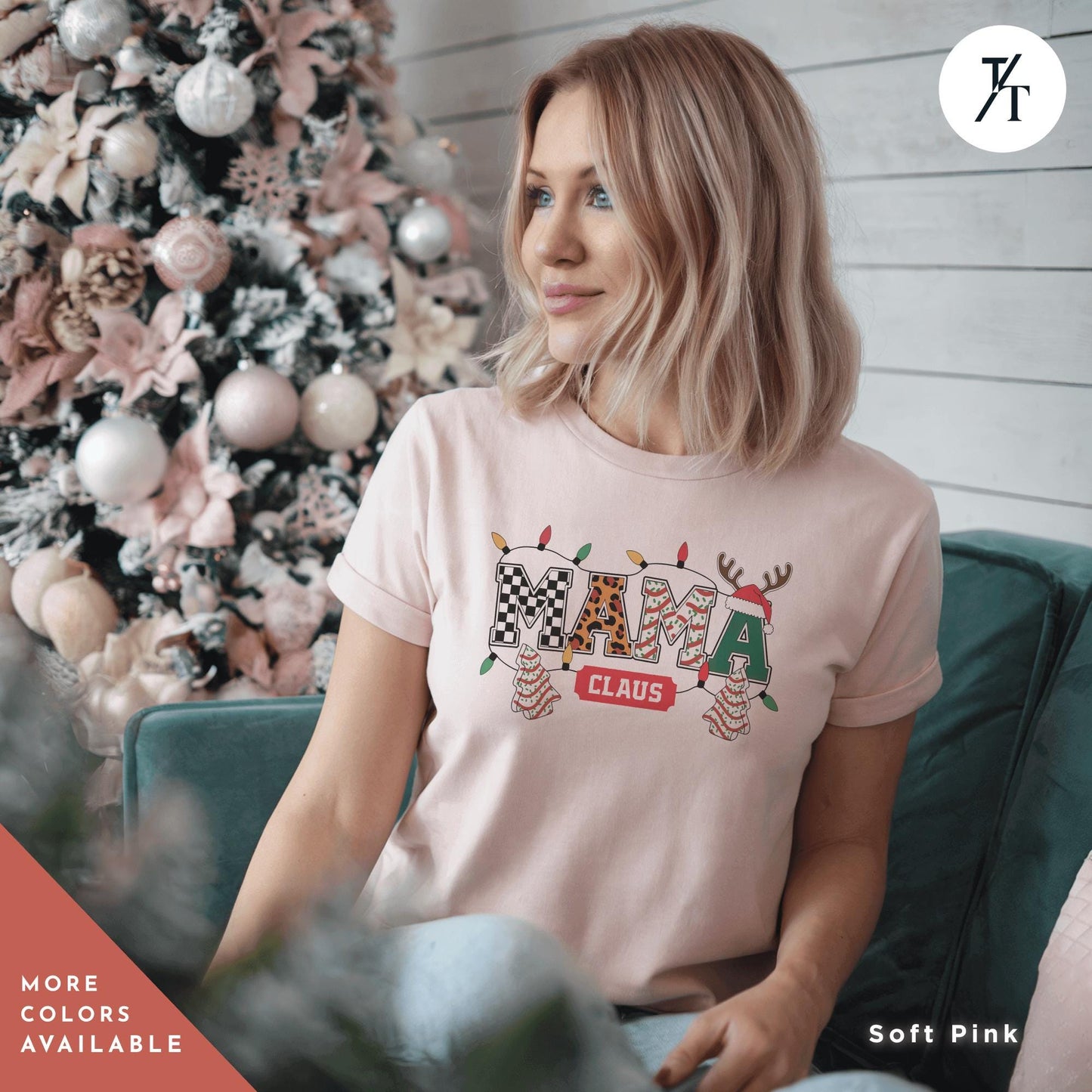 a woman sitting on a couch in front of a christmas tree, Mama Varsity Christmas Tree Cake Mama Claus Christmas Varsity Shirt, Mama Christmas shirt, Retro Xmas Leopard Coquette Gift For Mom tee