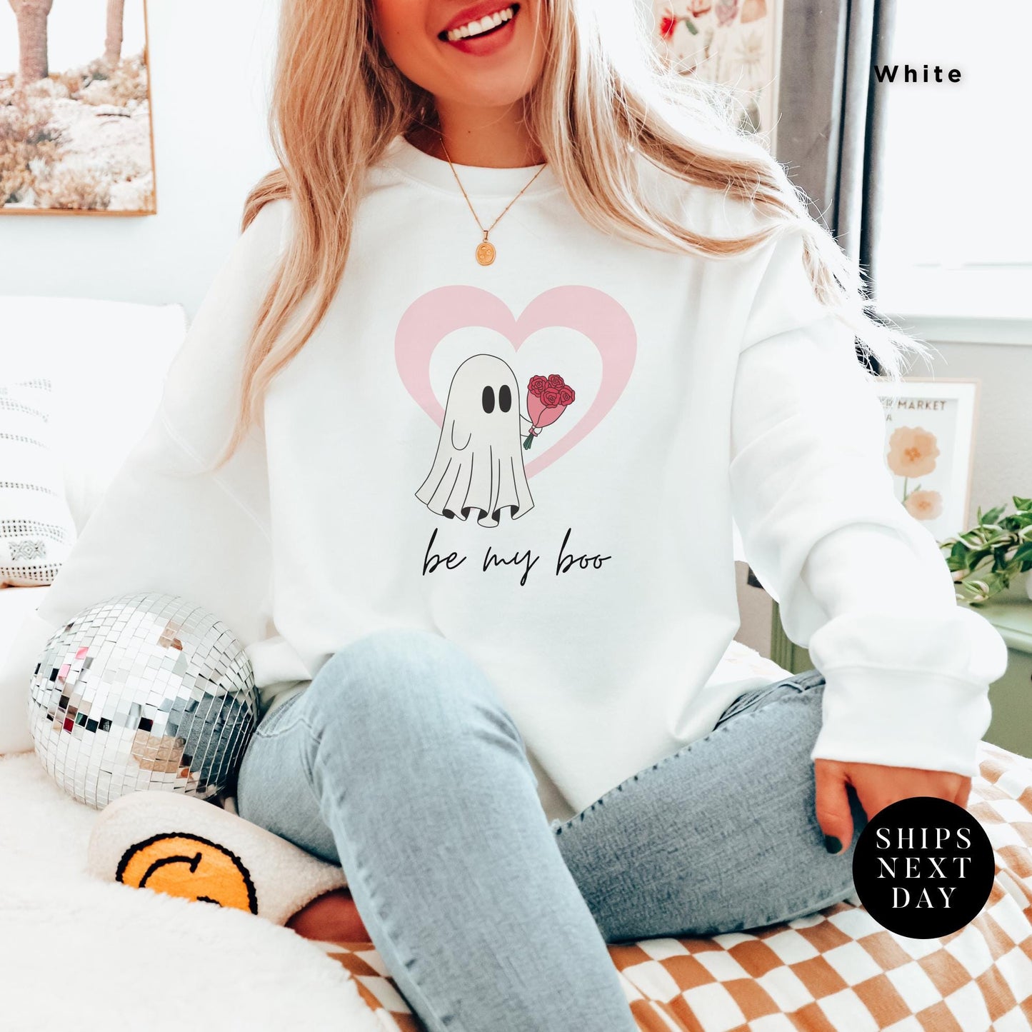 a woman wearing a white sweatshirt with a picture ghost with roses that says Be My Boo Sweatshirt, ghost sweater, valentines day hoodie, Valentine Sweatshirt, Heart Sweatshirts, Ghost Sweater, Be Mine Sweatshirts Xoxo