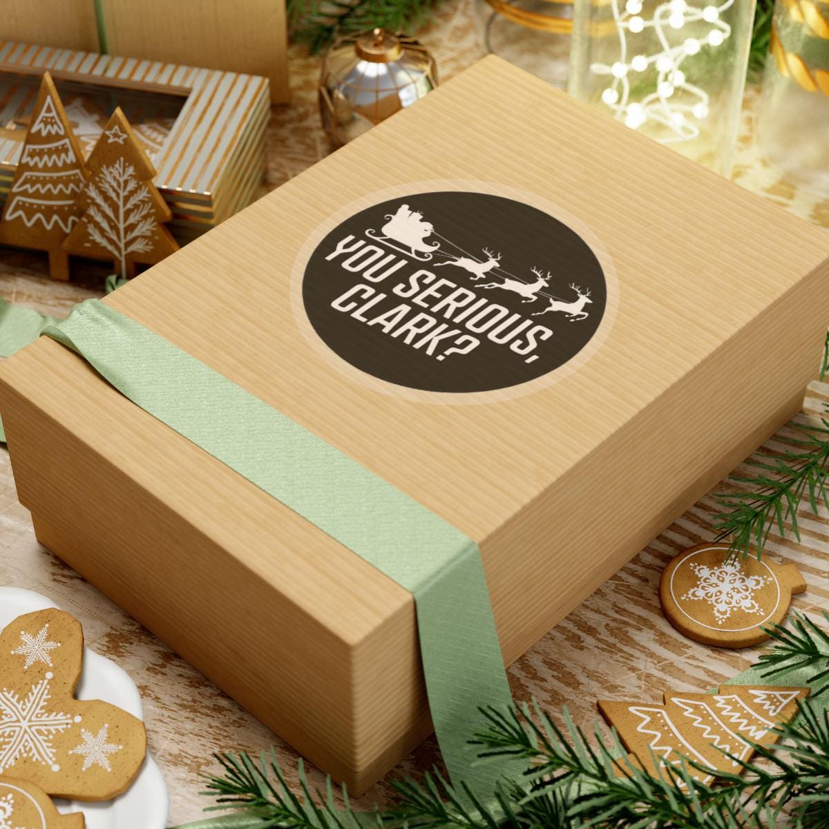 a wooden box with a green ribbon around it, National Lampoons Decal, Christmas Vacation stickers, Chevy Chase Stocking Stuffer, Funny You Serious Clark Christmas Vinyl Laptop Stickers