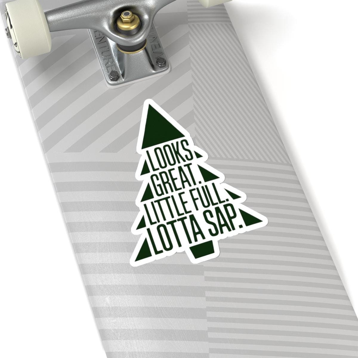 a skateboard with a christmas tree sticker on it, National Lampoons Decal, Christmas Vacation stickers, Chevy Chase Stocking Stuffer, Funny You Serious Clark Christmas Vinyl Laptop Stickers
