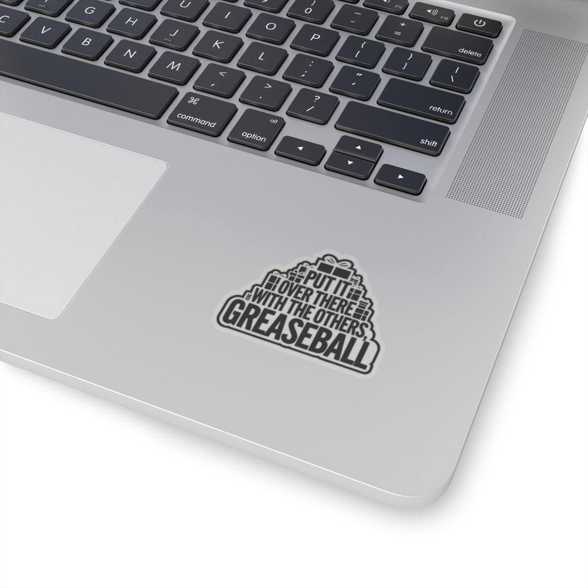a laptop computer with a sticker on the keyboard, National Lampoons Decal, Christmas Vacation stickers, Chevy Chase Stocking Stuffer, Funny You Serious Clark Christmas Vinyl Laptop Stickers