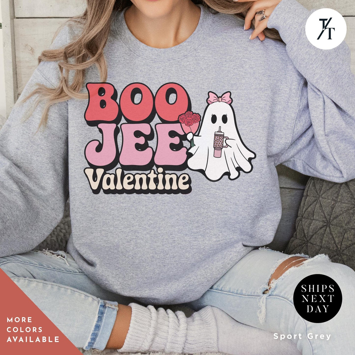 Woman wearing a sweatshirtwith a ghost holding roses and a stanley cup hat says "Boo Jee Valentine"