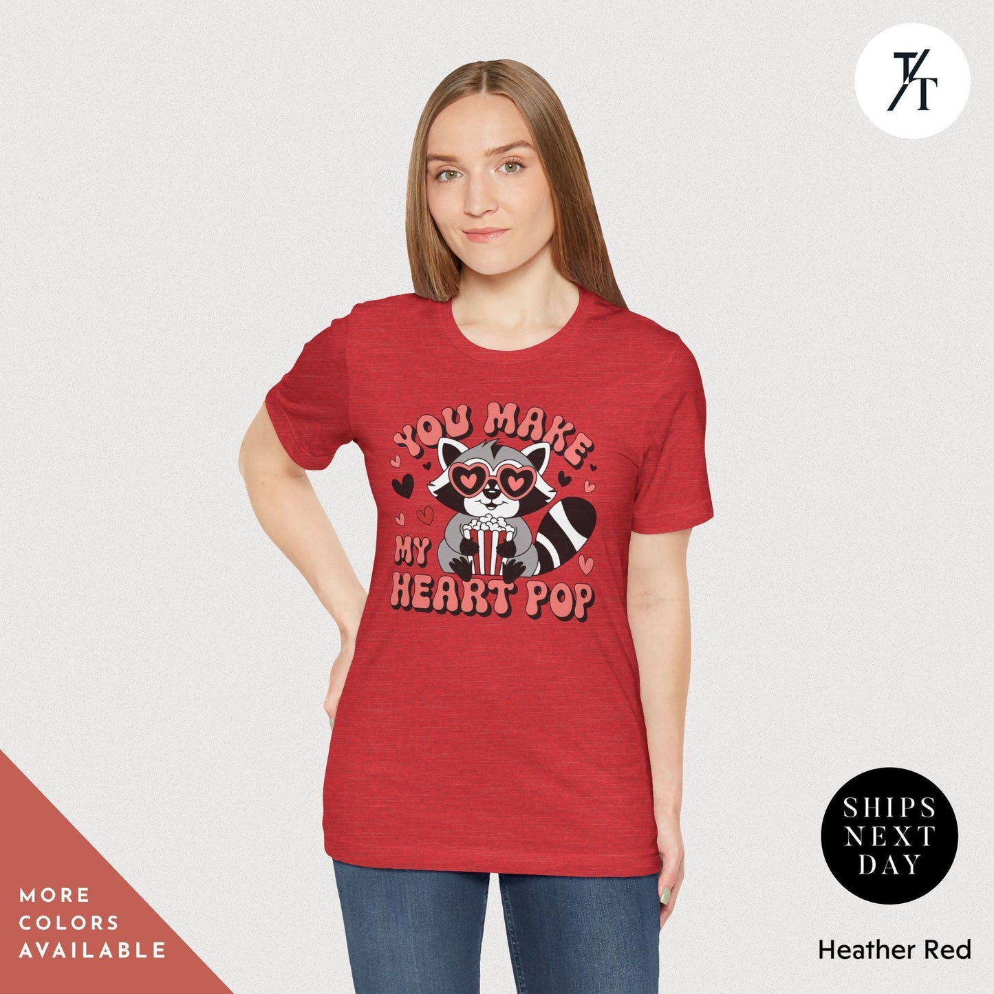 a woman wearing a red t - shirt that says, you make my heart pop