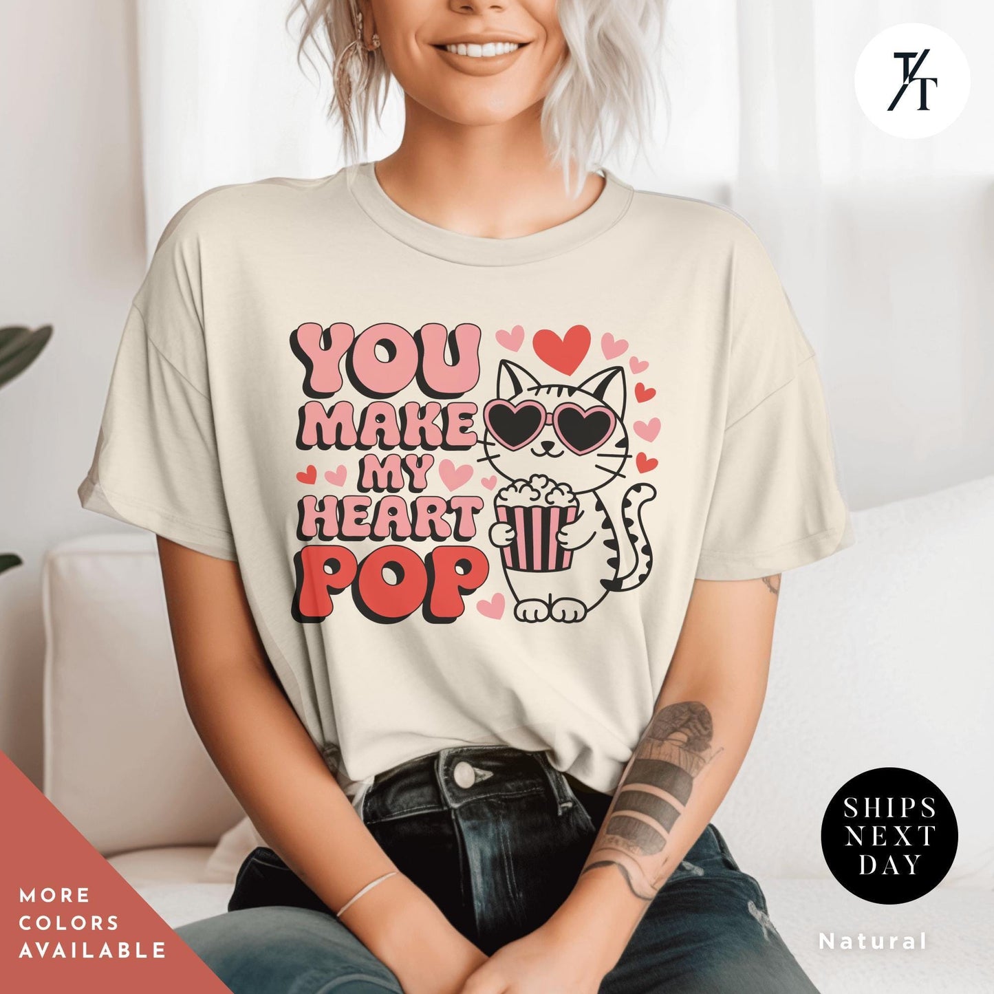 a woman sitting on a couch wearing a t - shirt that says you make my heart pop, You Make My Heart Pop Shirt, Valentine Cat Shirt, Retro Valentines Day Shirts, Funny Valentine Tee, Cute Popcorn Valentines Gift for Her