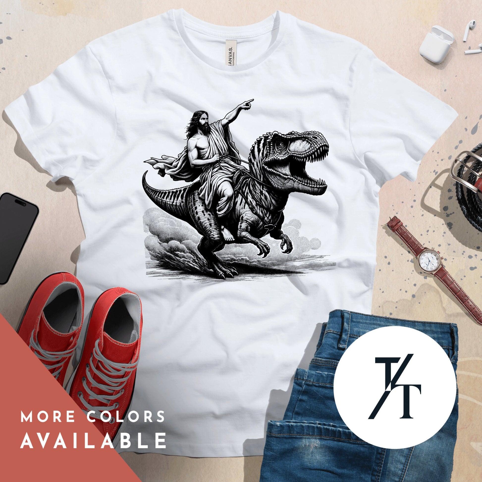 a t - shirt with a picture of a woman riding a dinosaur