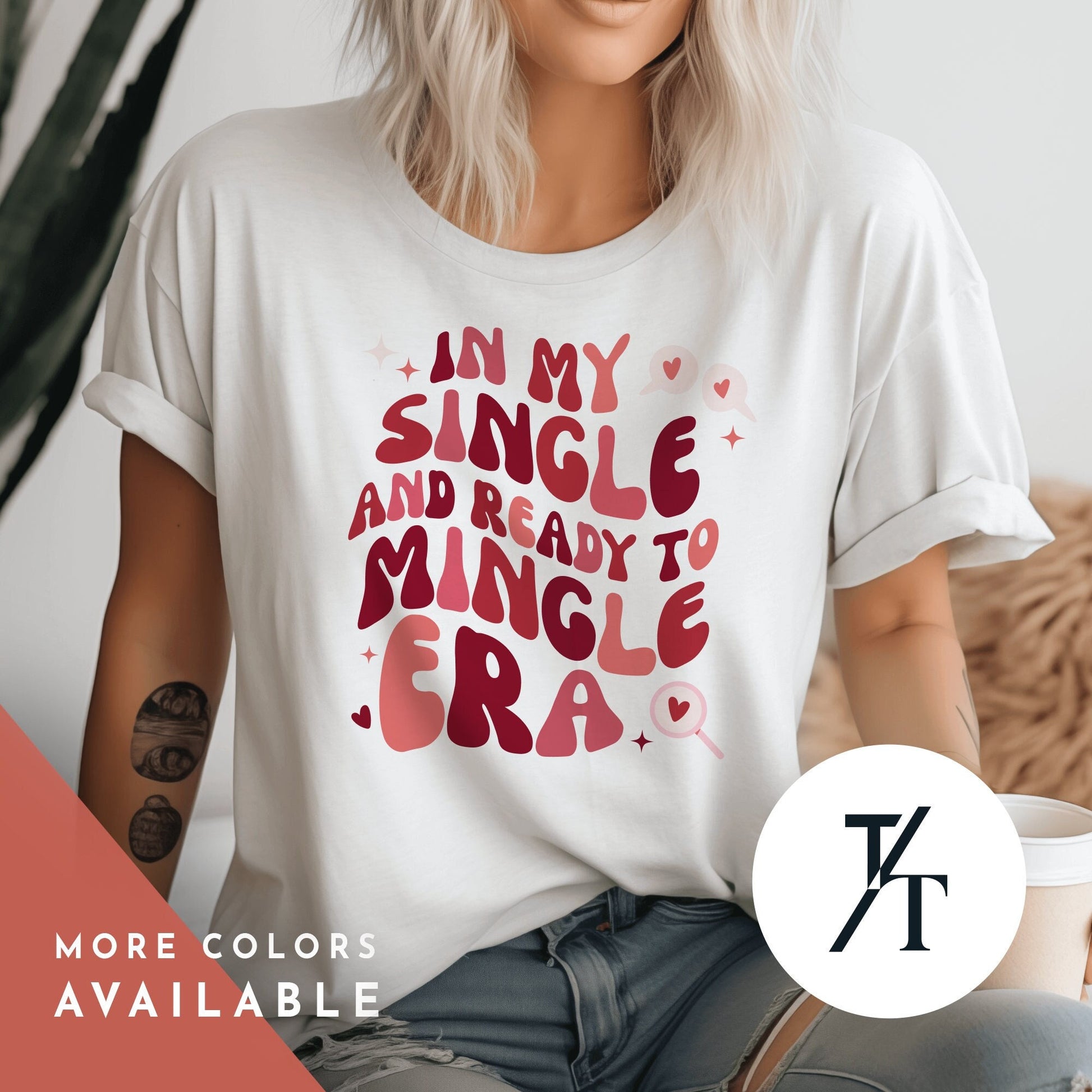 a woman wearing a shirt that says in my single and ready to mingle era