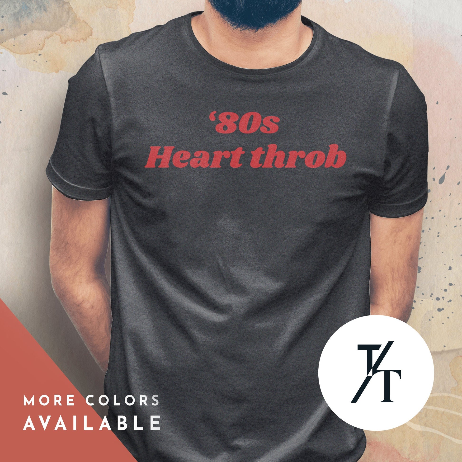 a man wearing a white t - shirt with the words 80&#39;s heart throb